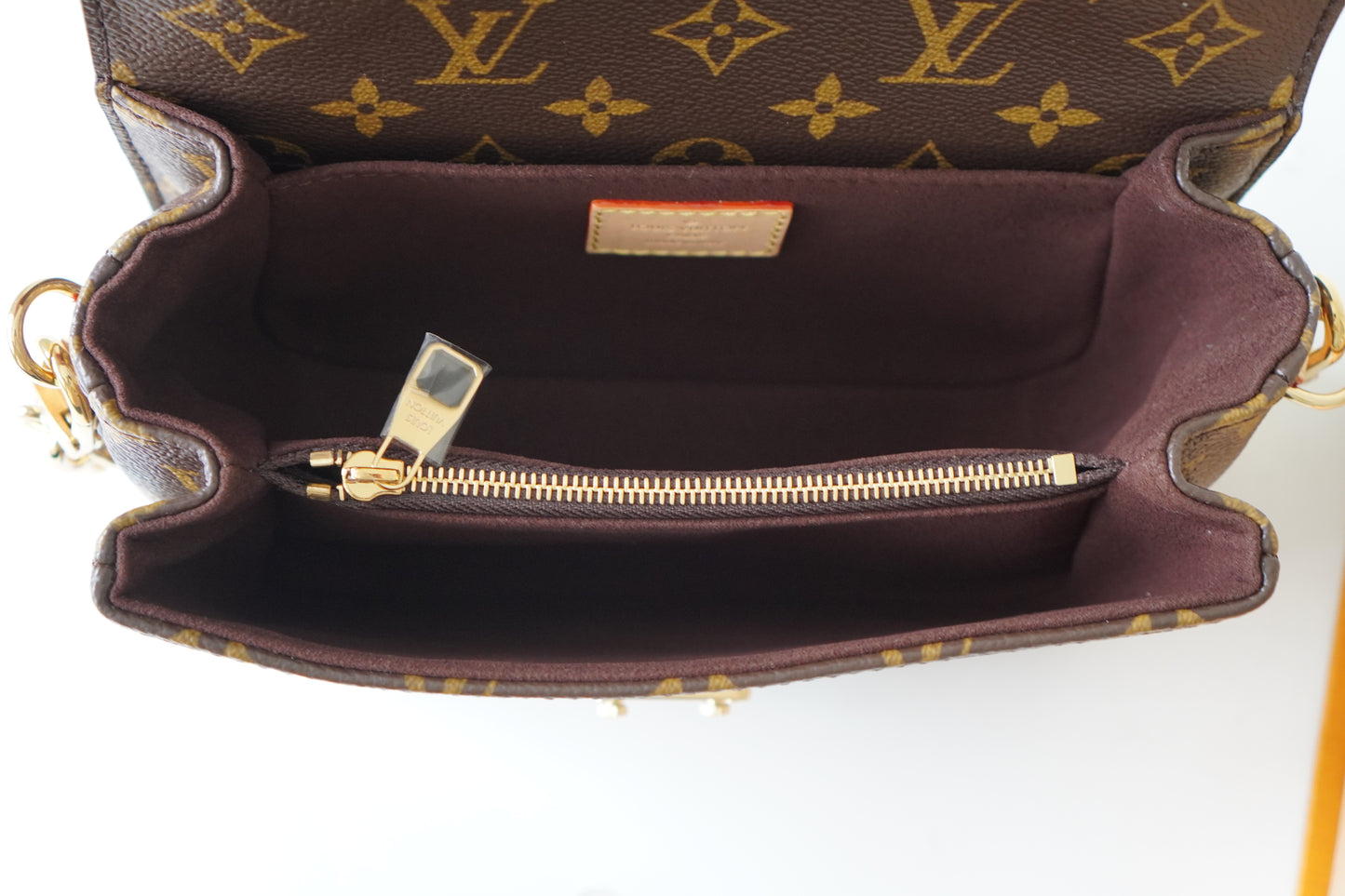 LV Pochette Métis East West