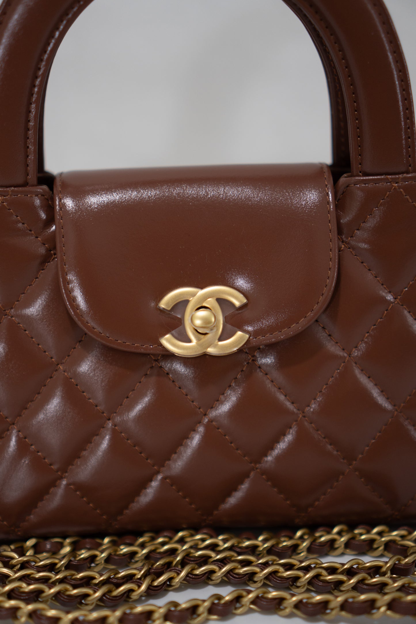 Quilted Mini KL Top Handle Bag – Brown Aged Calfskin Leather with Gold Hardware