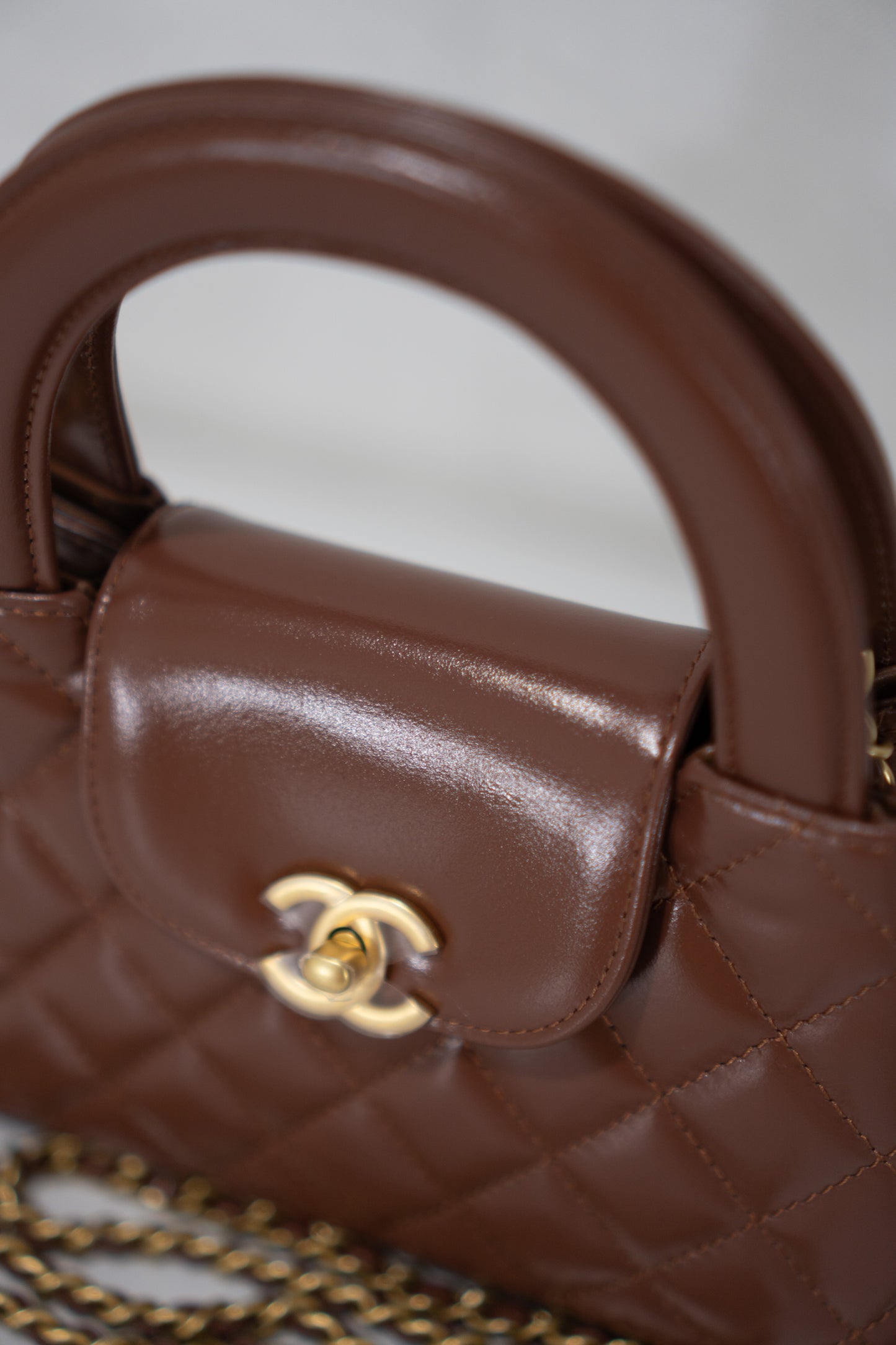 Quilted Mini KL Top Handle Bag – Brown Aged Calfskin Leather with Gold Hardware