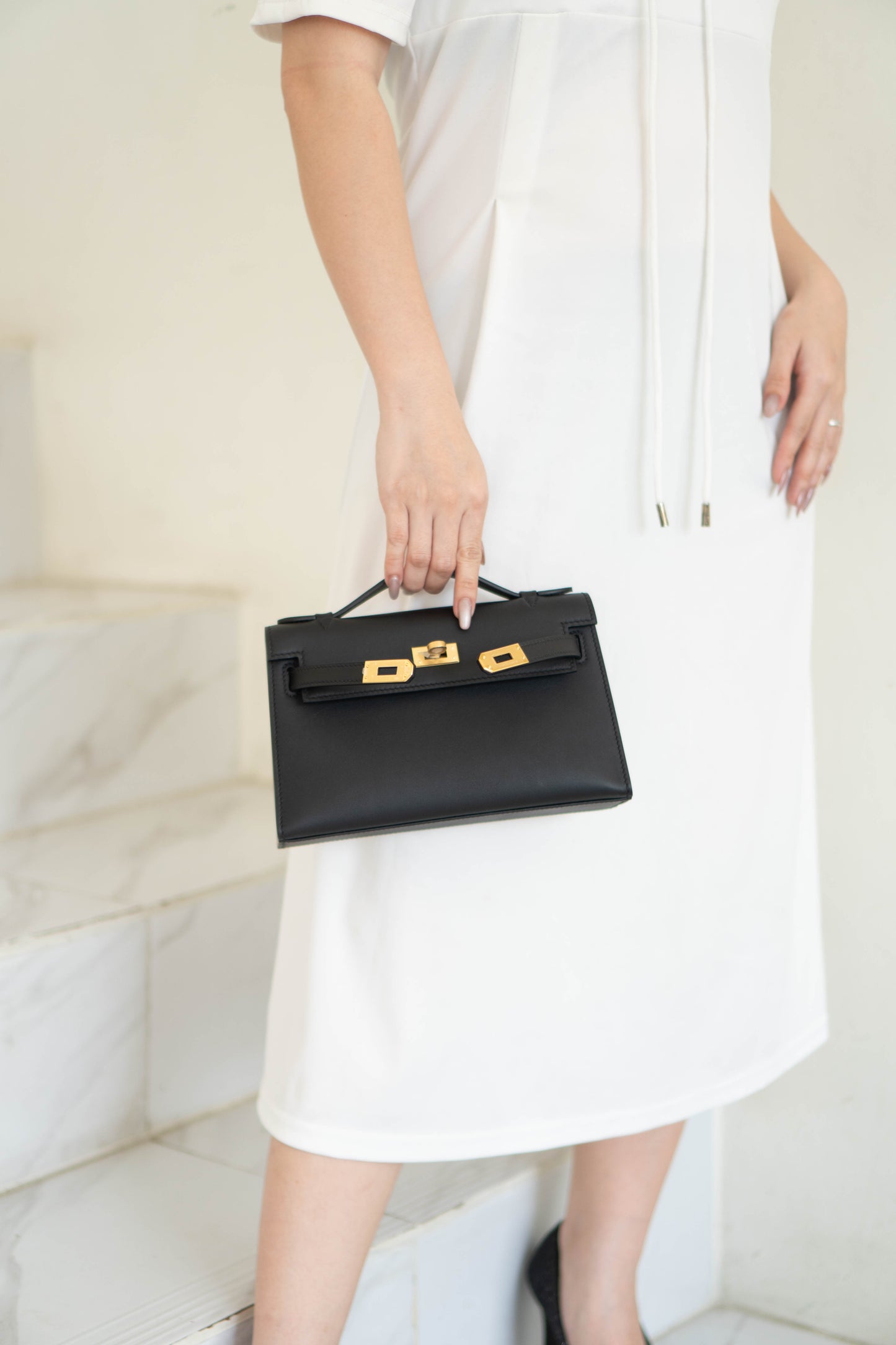 Mini Pochette – Black Swift Leather with Gold Hardware