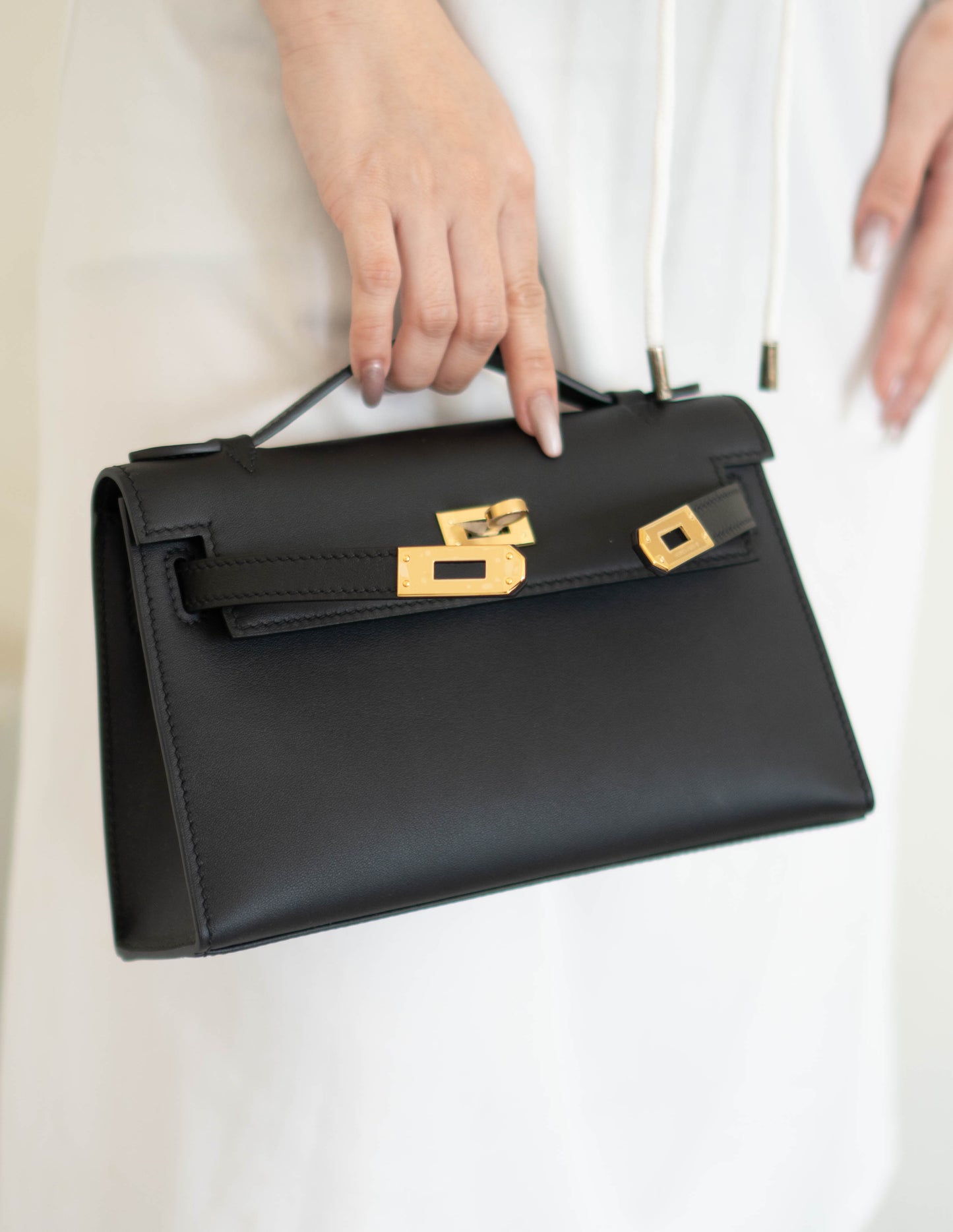 Mini Pochette – Black Swift Leather with Gold Hardware