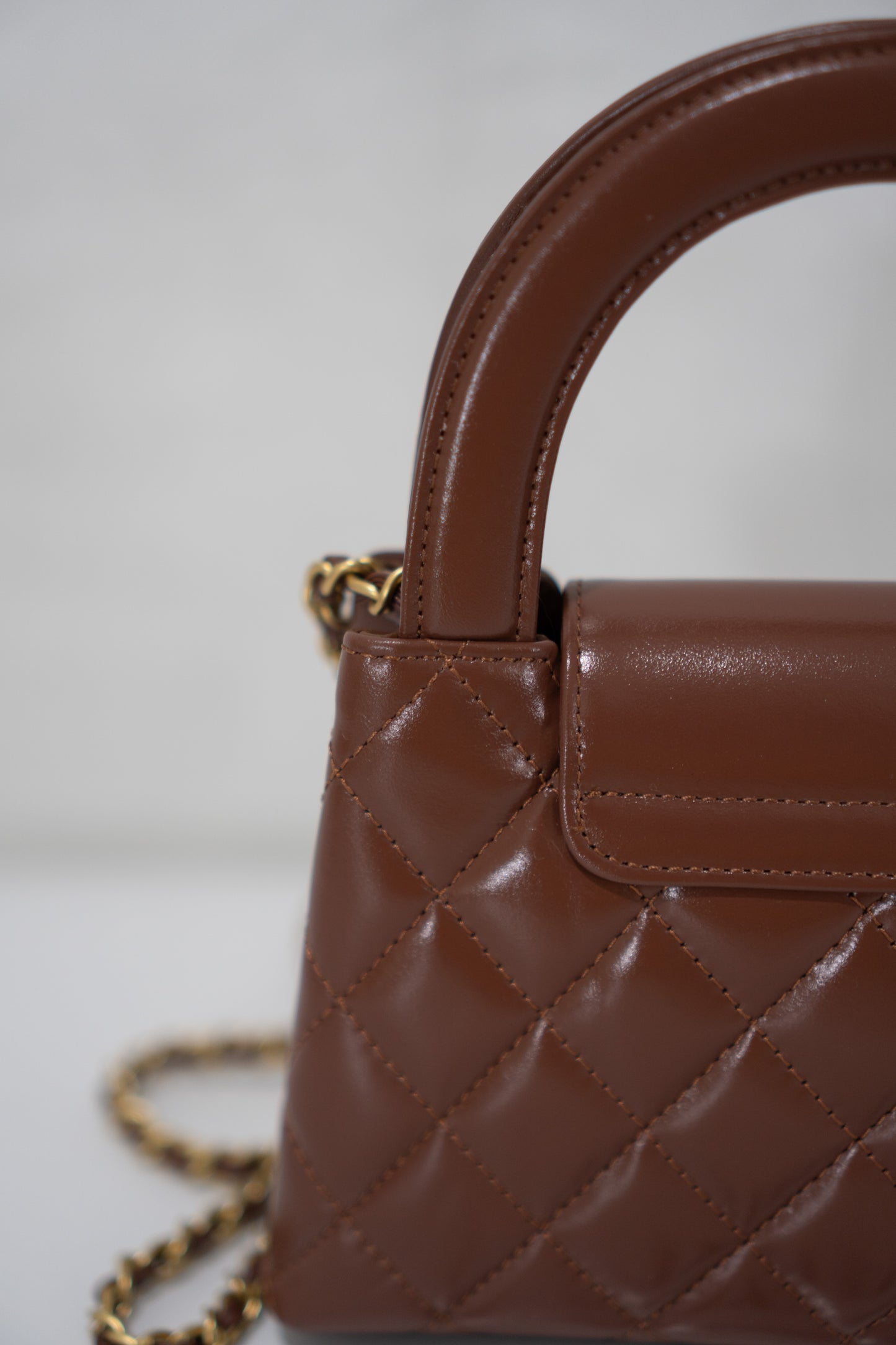 Quilted Mini KL Top Handle Bag – Brown Aged Calfskin Leather with Gold Hardware