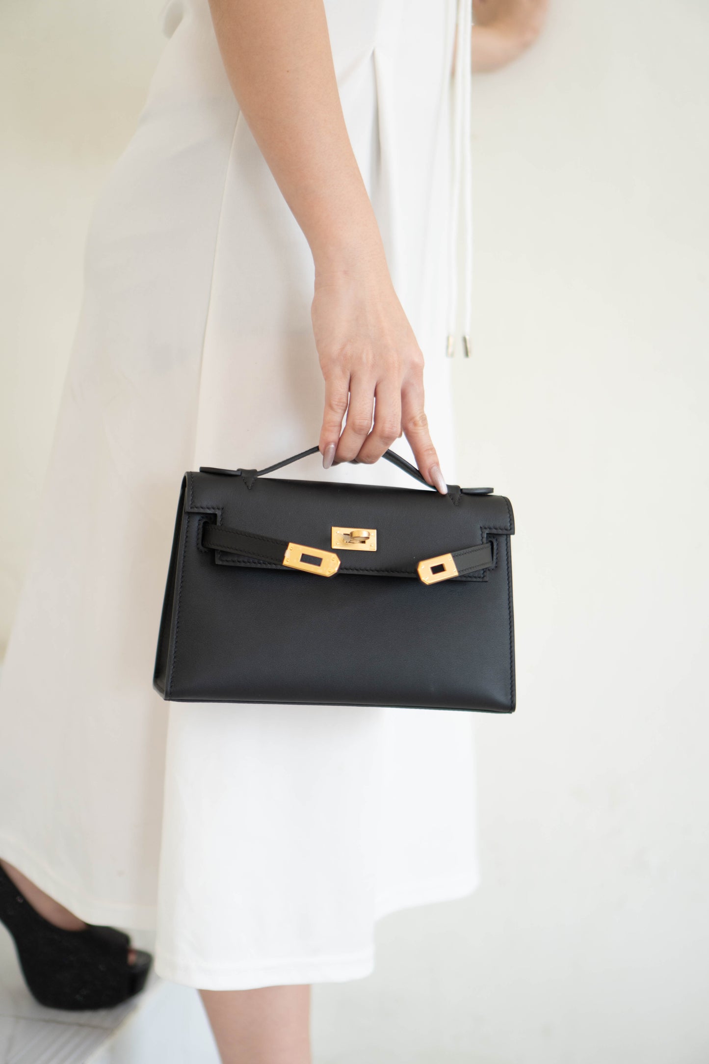 Mini Pochette – Black Swift Leather with Gold Hardware