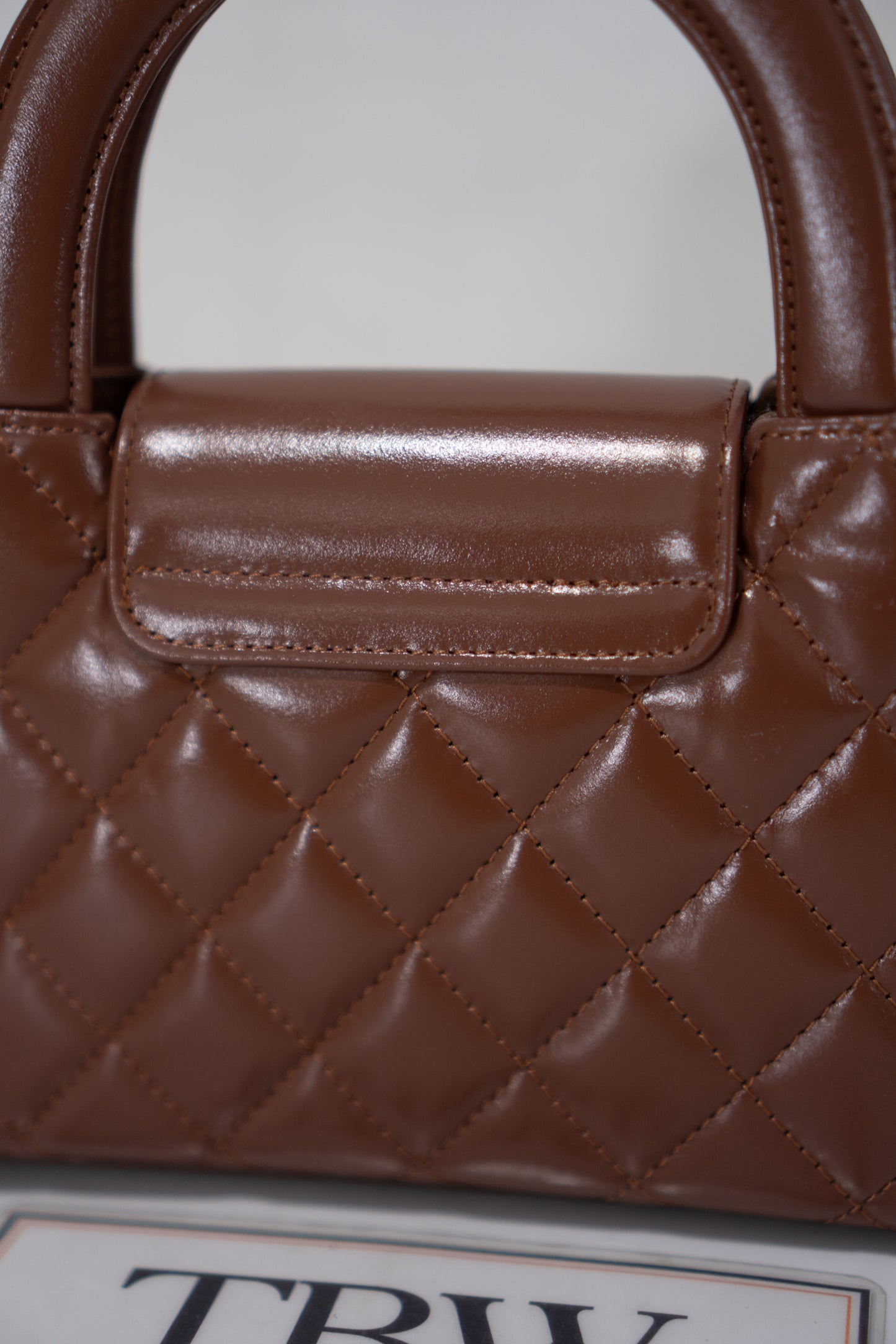 Quilted Mini KL Top Handle Bag – Brown Aged Calfskin Leather with Gold Hardware