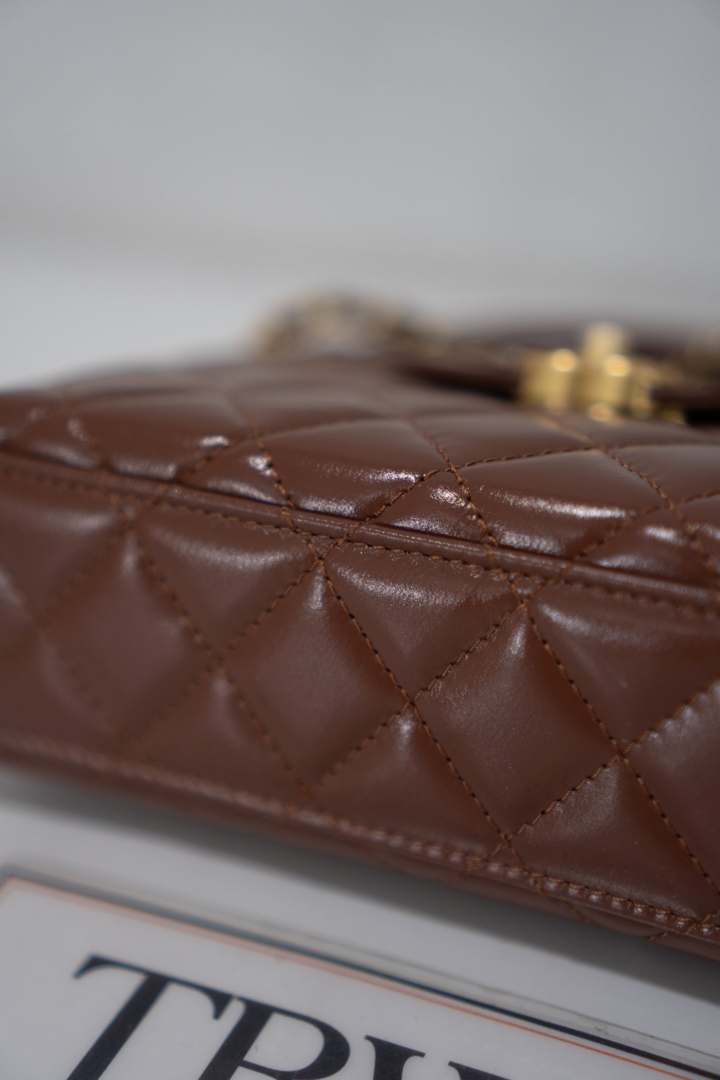 Quilted Mini KL Top Handle Bag – Brown Aged Calfskin Leather with Gold Hardware