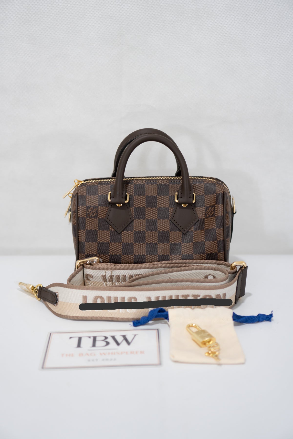 Checkerboard Speedy Bandoulière 20 – Dark Brown Coated Canvas with Gold Hardware