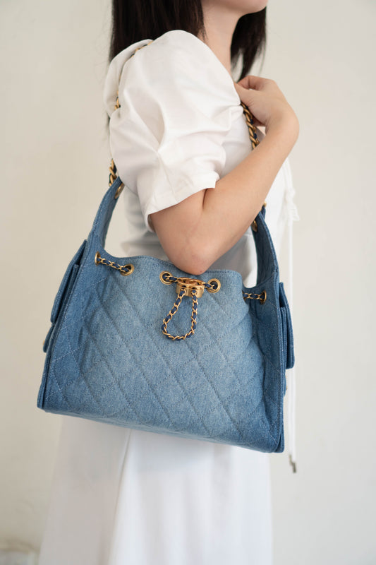 C25 Drawstring Bag – Denim Quilted Fabric with Gold Hardware (25s Collection)
