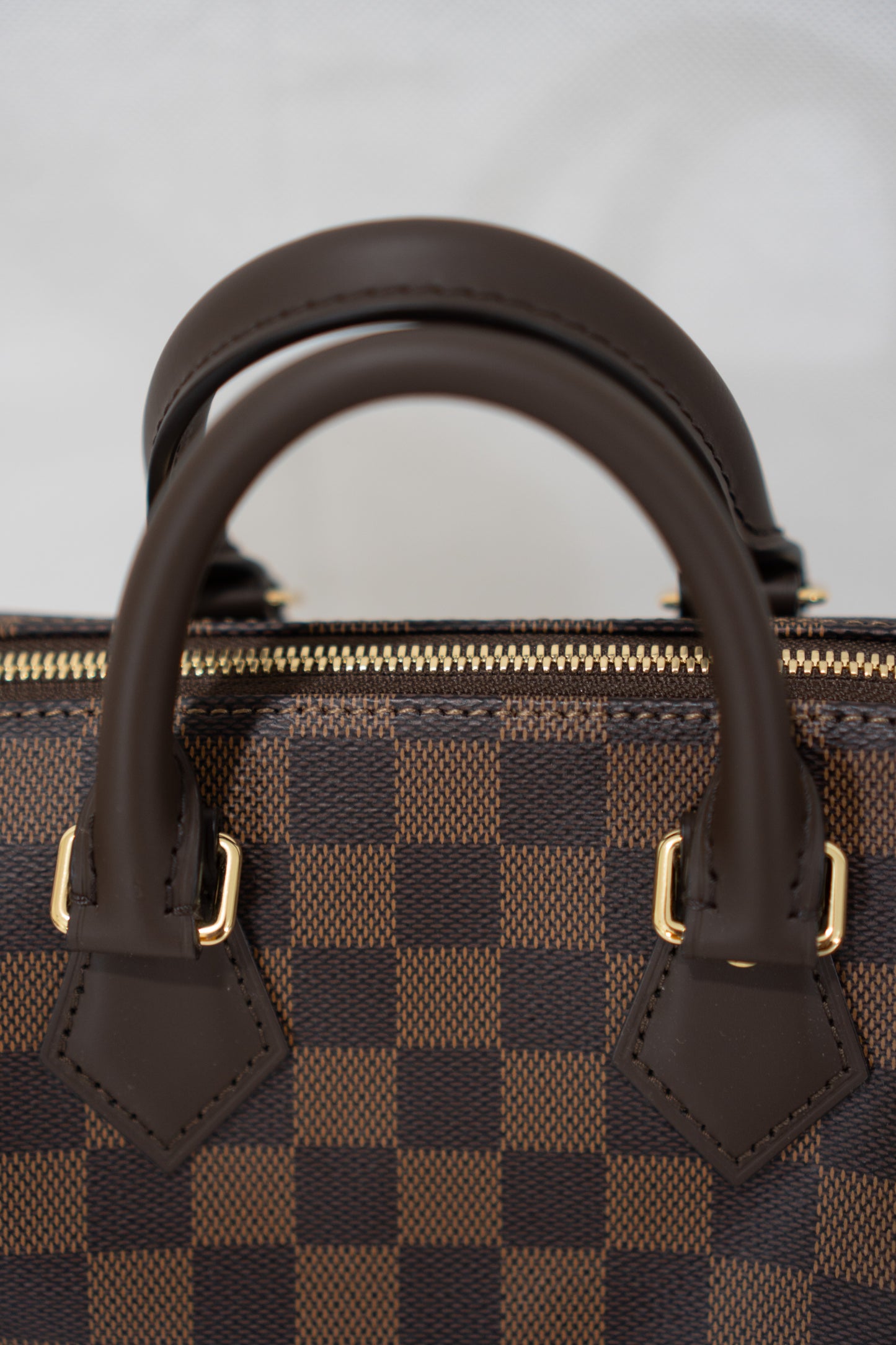 Checkerboard Speedy Bandoulière 20 – Dark Brown Coated Canvas with Gold Hardware