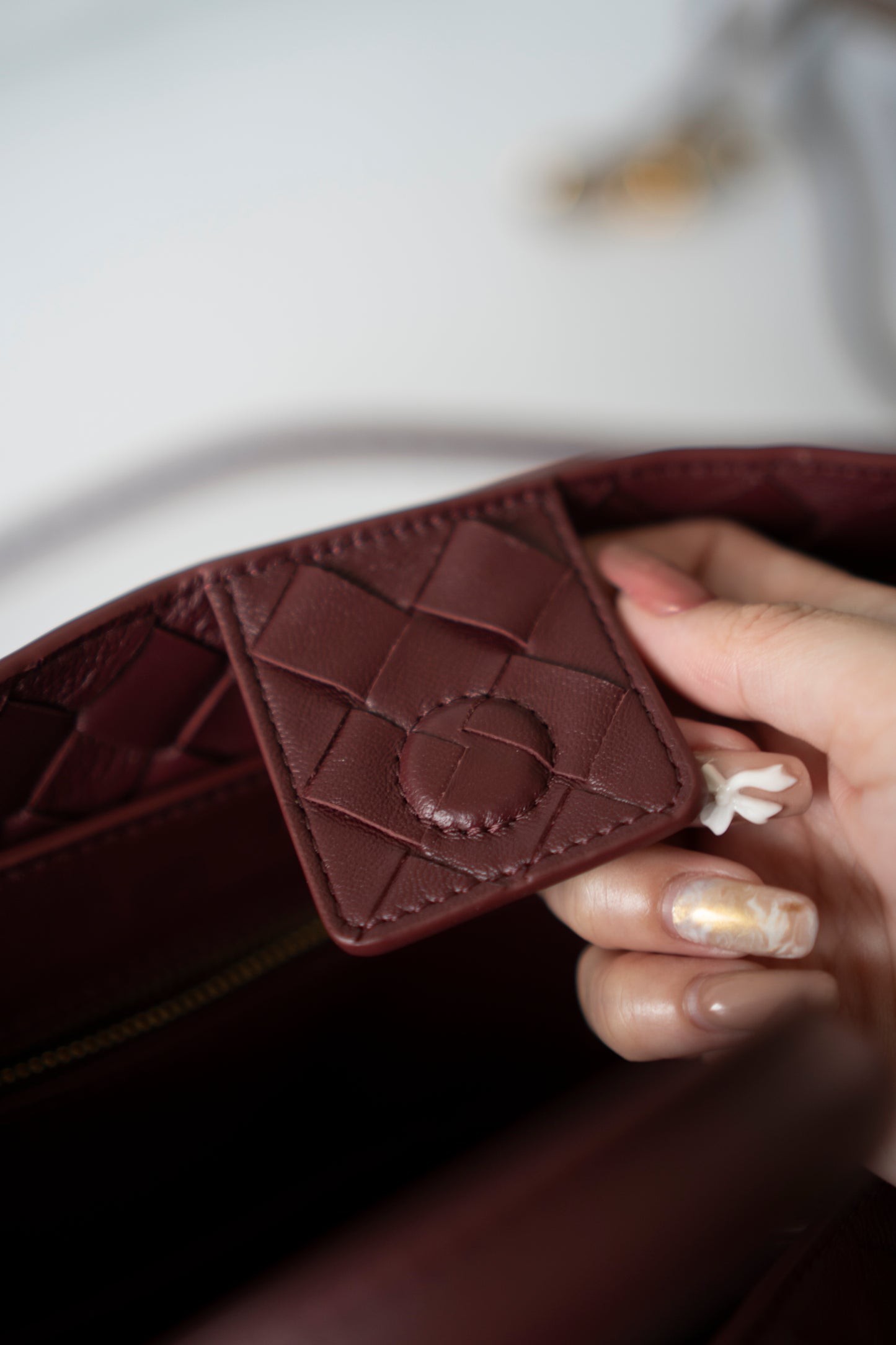 Andiamo Medium – Burgundy Intrecciato Nappa with Gold Hardware