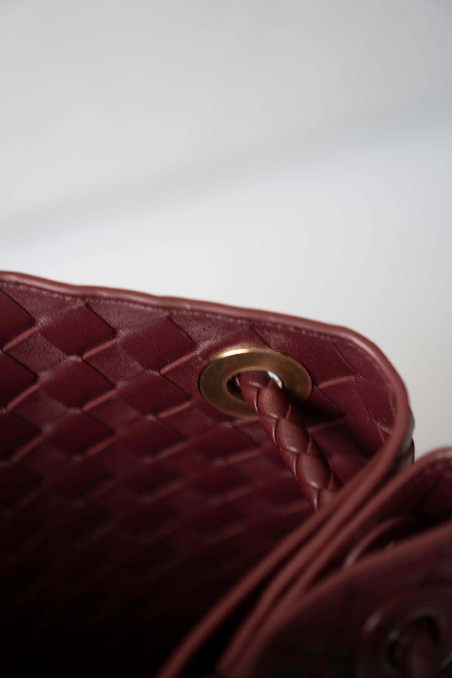 Andiamo Medium – Burgundy Intrecciato Nappa with Gold Hardware