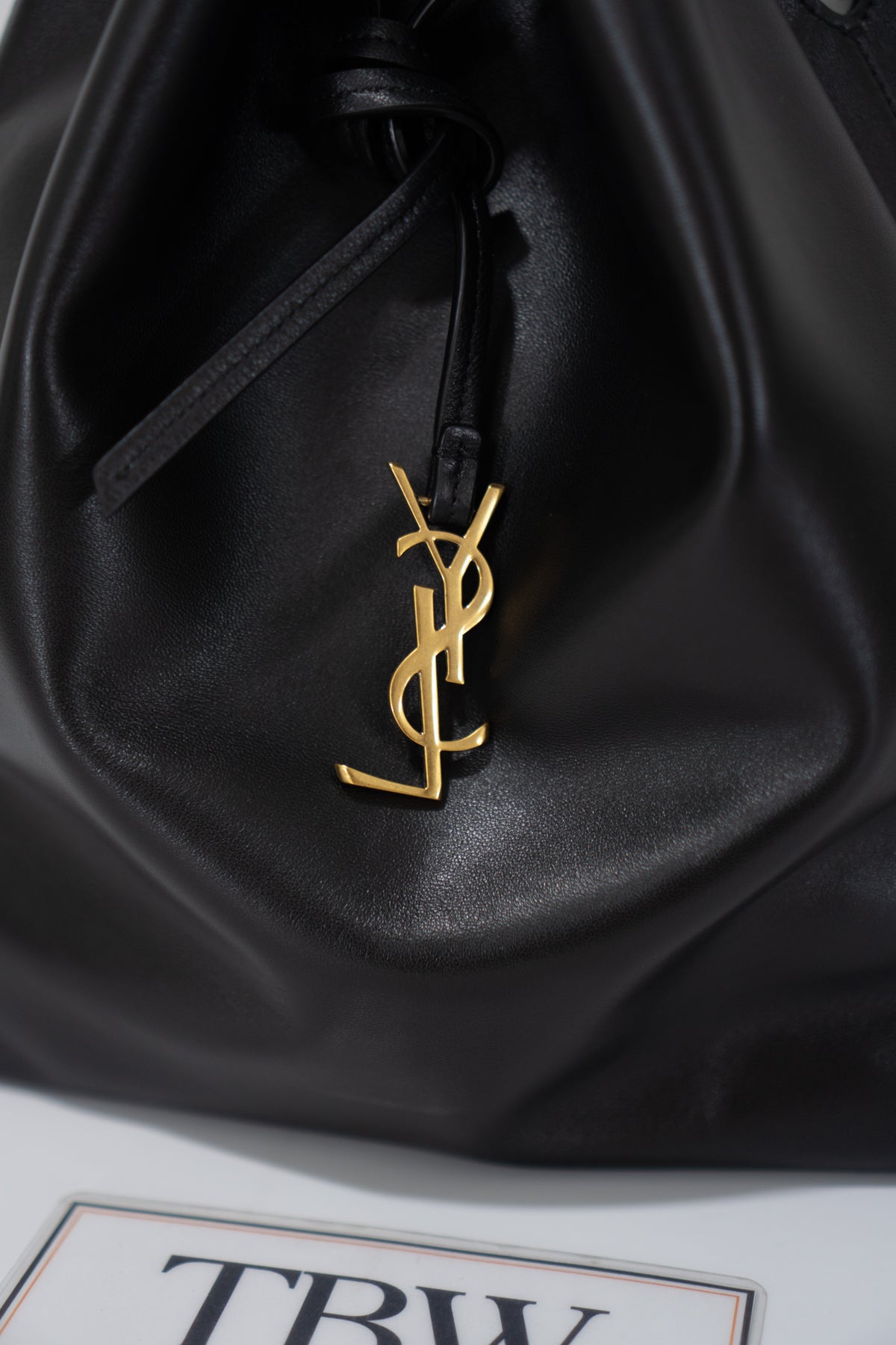 Monogram Drawstring Bucket Bag – Black Lambskin Leather with Gold Hardware