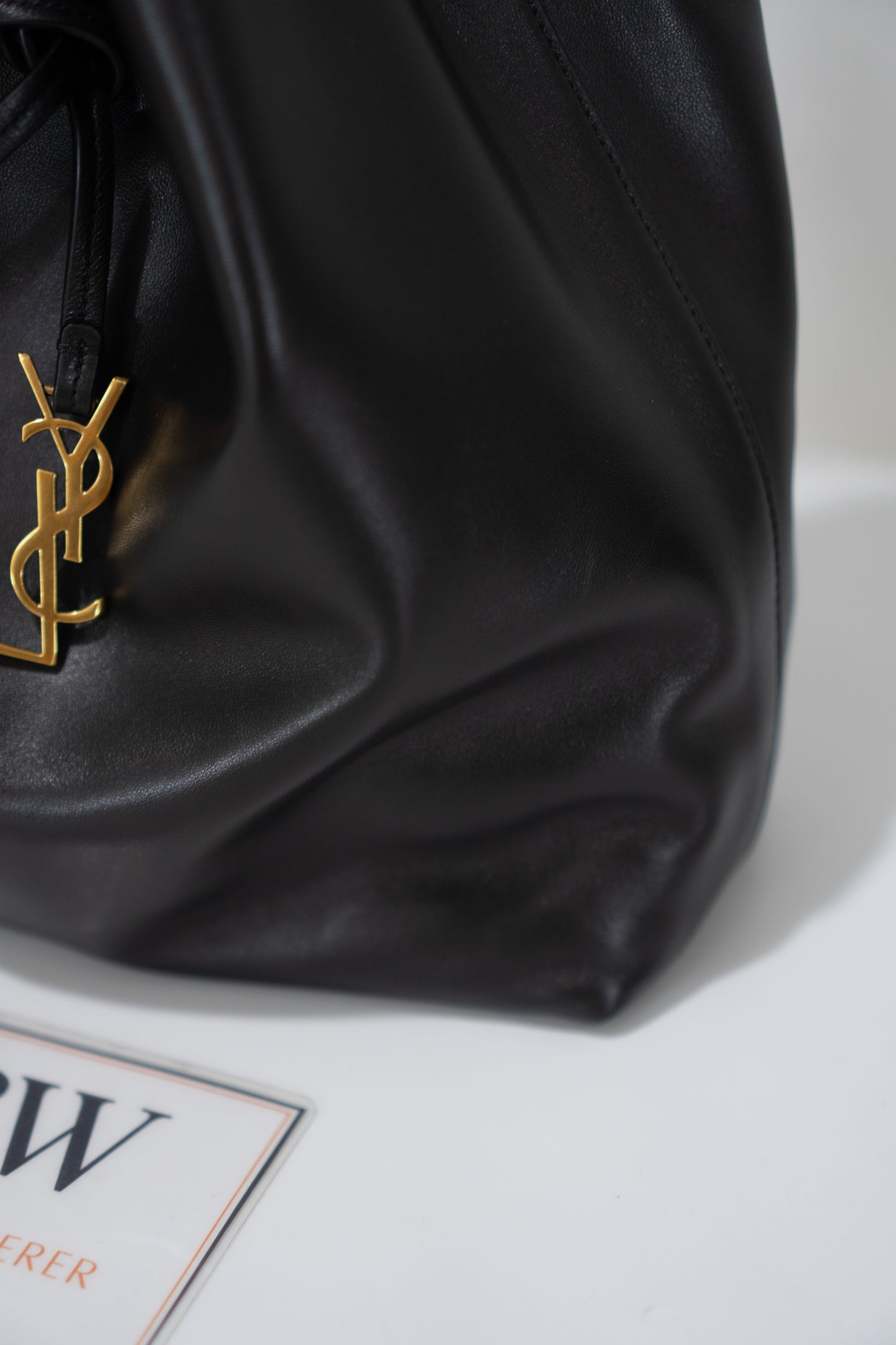 Monogram Drawstring Bucket Bag – Black Lambskin Leather with Gold Hardware