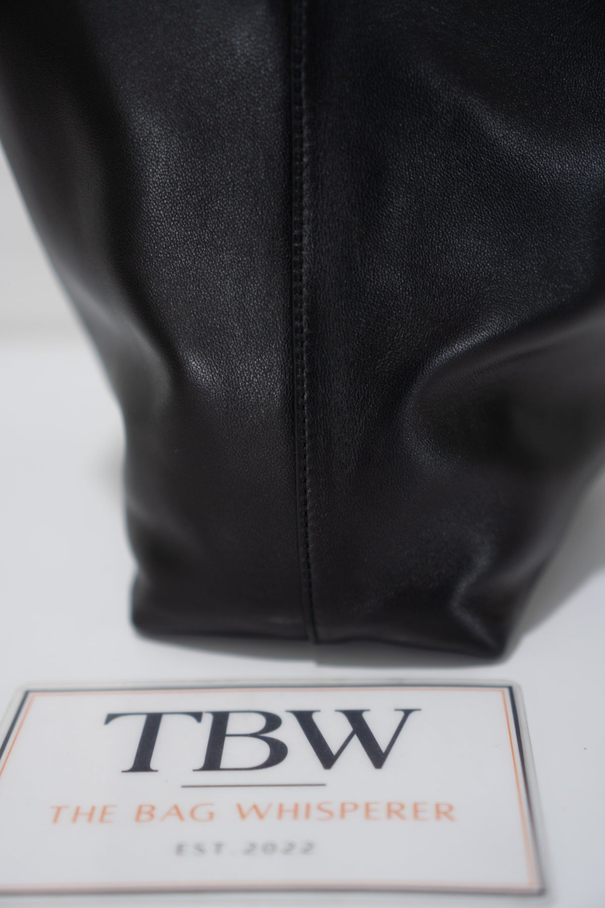 Monogram Drawstring Bucket Bag – Black Lambskin Leather with Gold Hardware