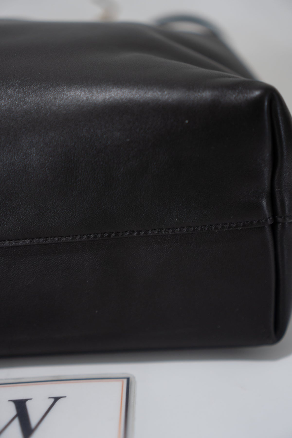 Monogram Drawstring Bucket Bag – Black Lambskin Leather with Gold Hardware