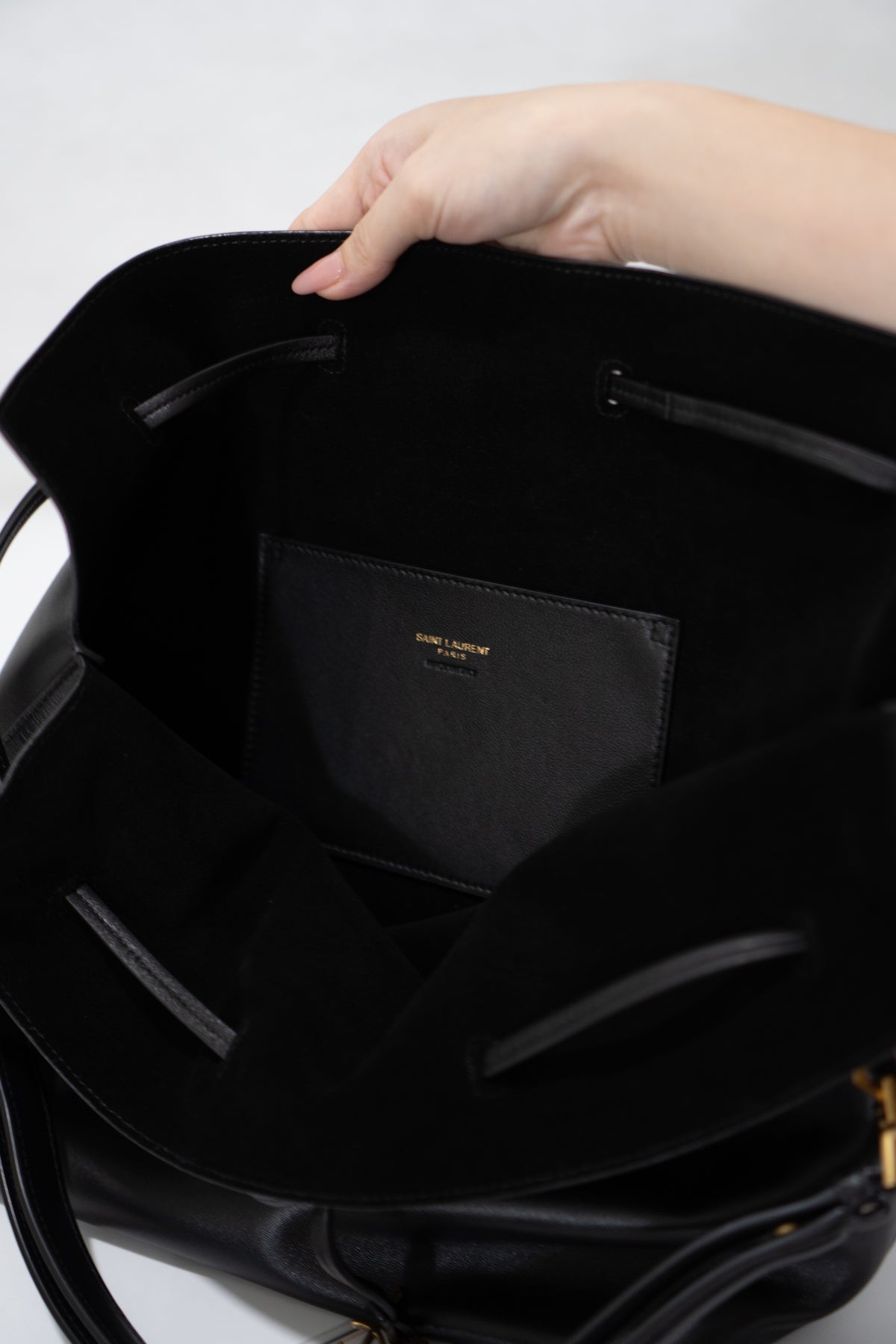Monogram Drawstring Bucket Bag – Black Lambskin Leather with Gold Hardware