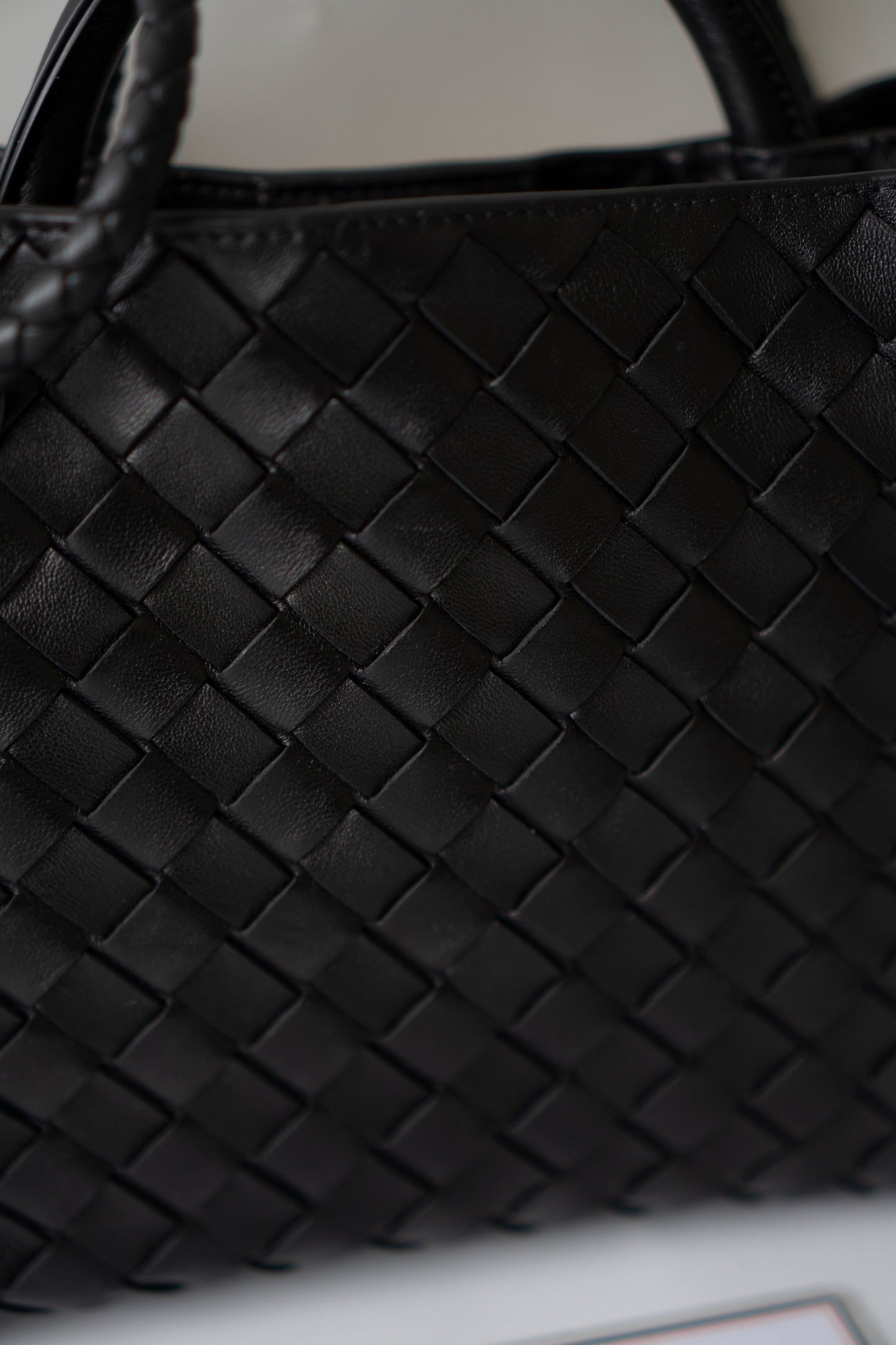 Andiamo Small – Black Intrecciato Nappa with Gold Hardware