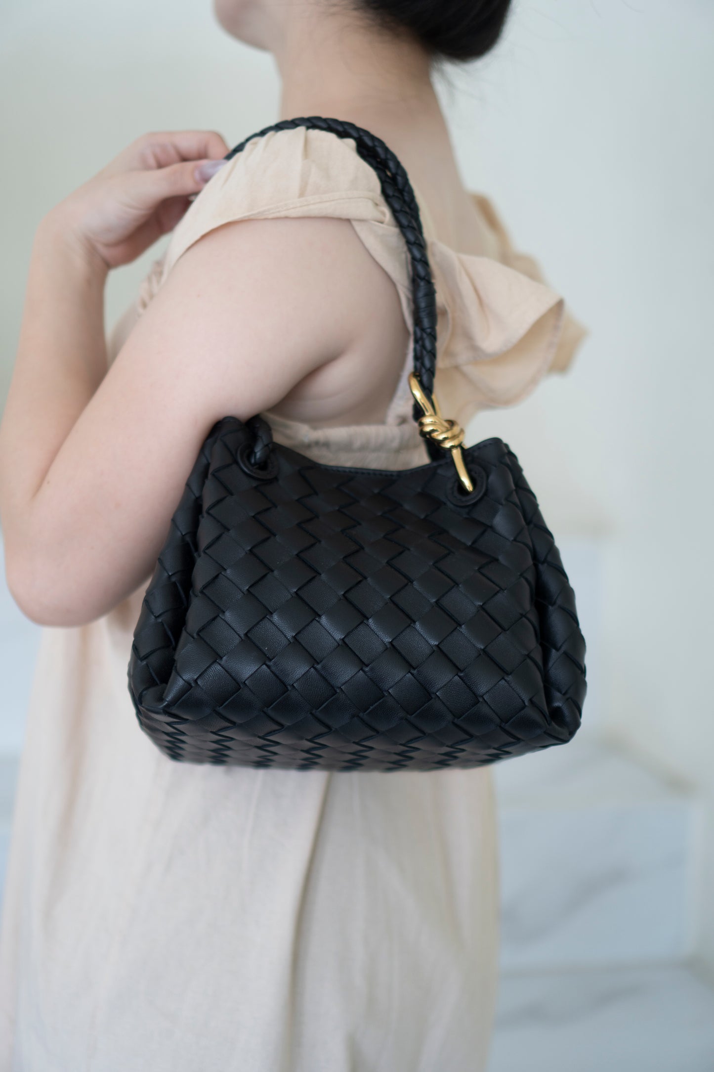 Parachute Bag – Black Intrecciato Leather with Gold Hardware