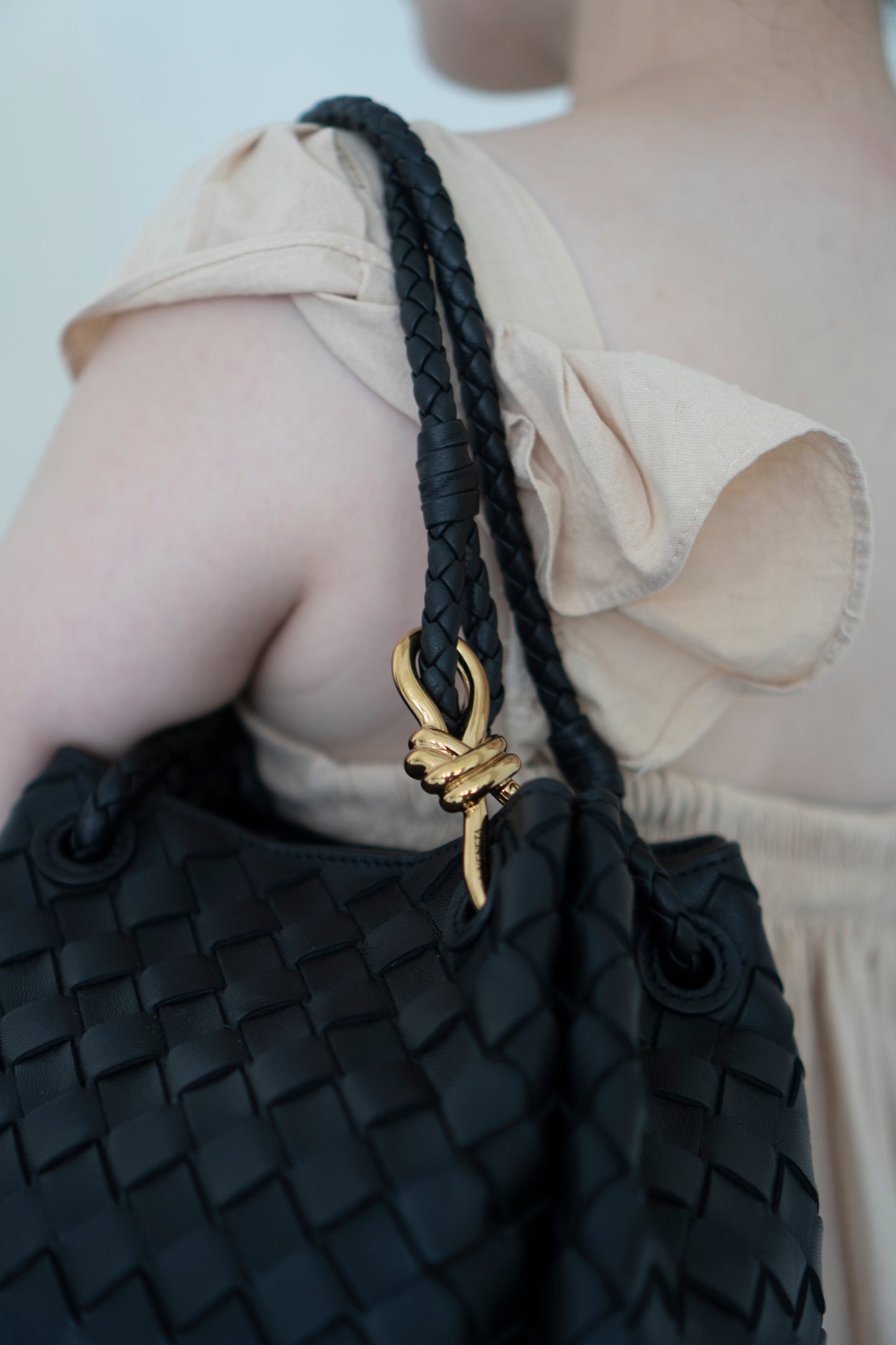 Parachute Bag – Black Intrecciato Leather with Gold Hardware