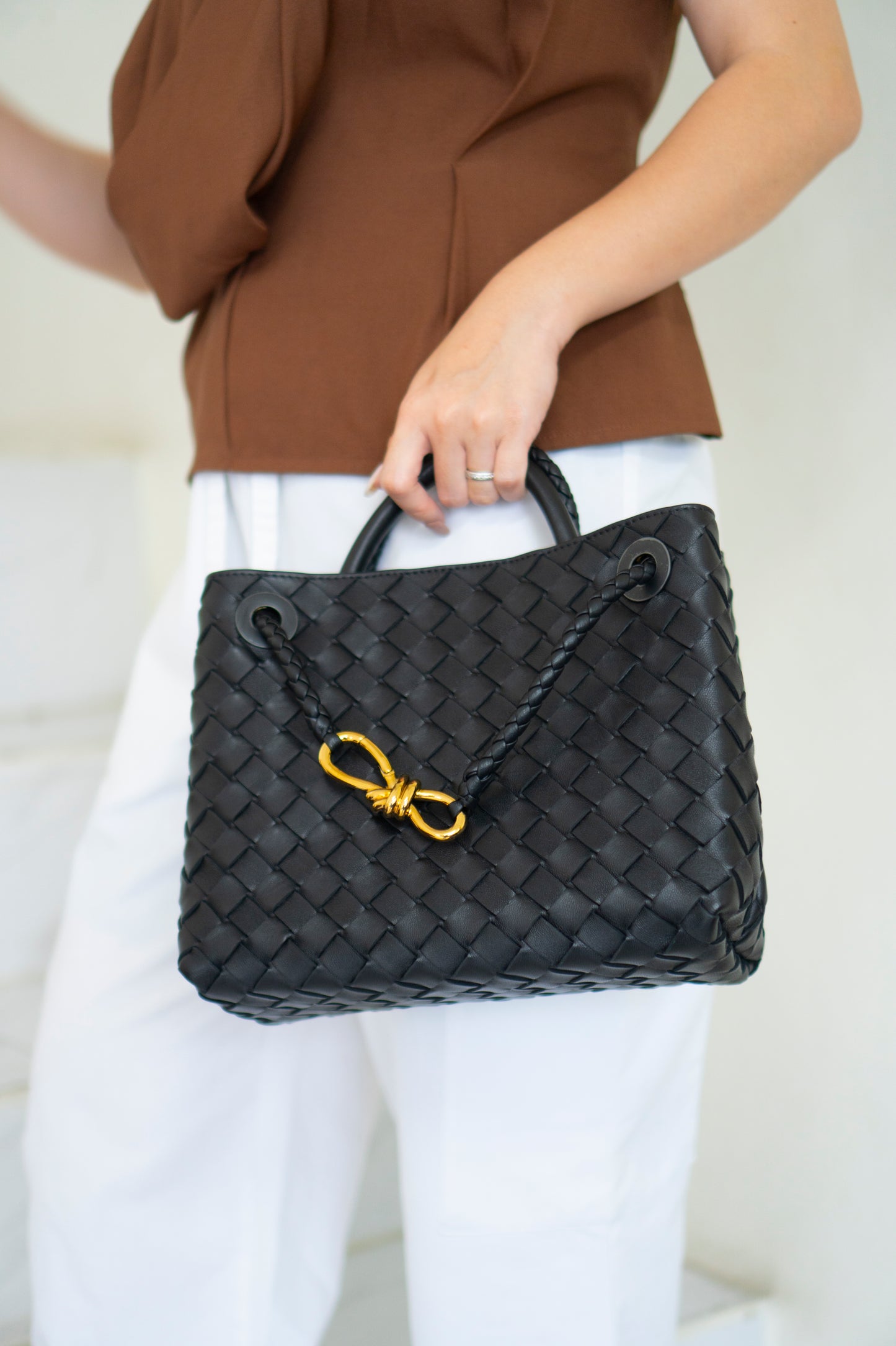 Andiamo Small – Black Intrecciato Nappa with Gold Hardware