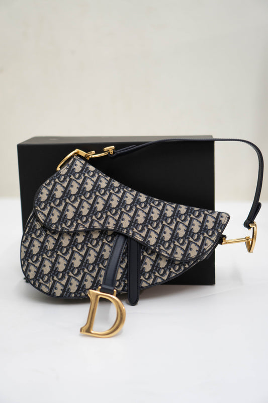 Saddle Oblique Jacquard canvas with calfskin leather