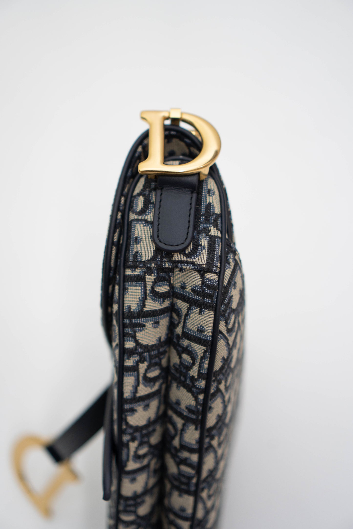 Saddle Oblique Jacquard canvas with calfskin leather