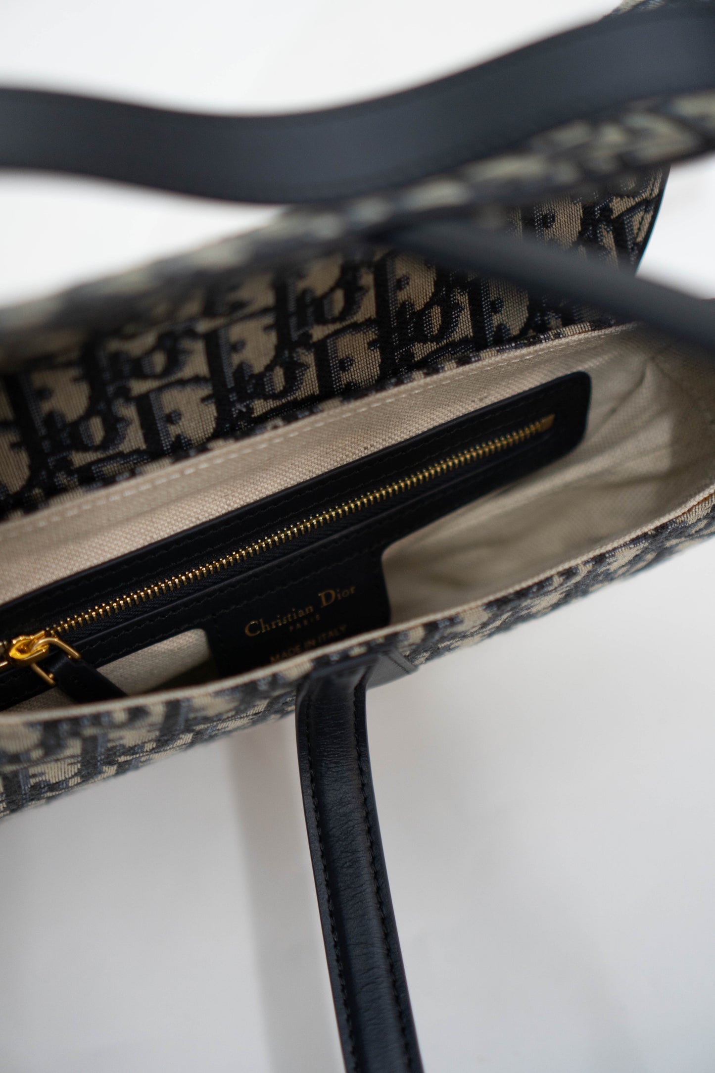 Saddle Oblique Jacquard canvas with calfskin leather