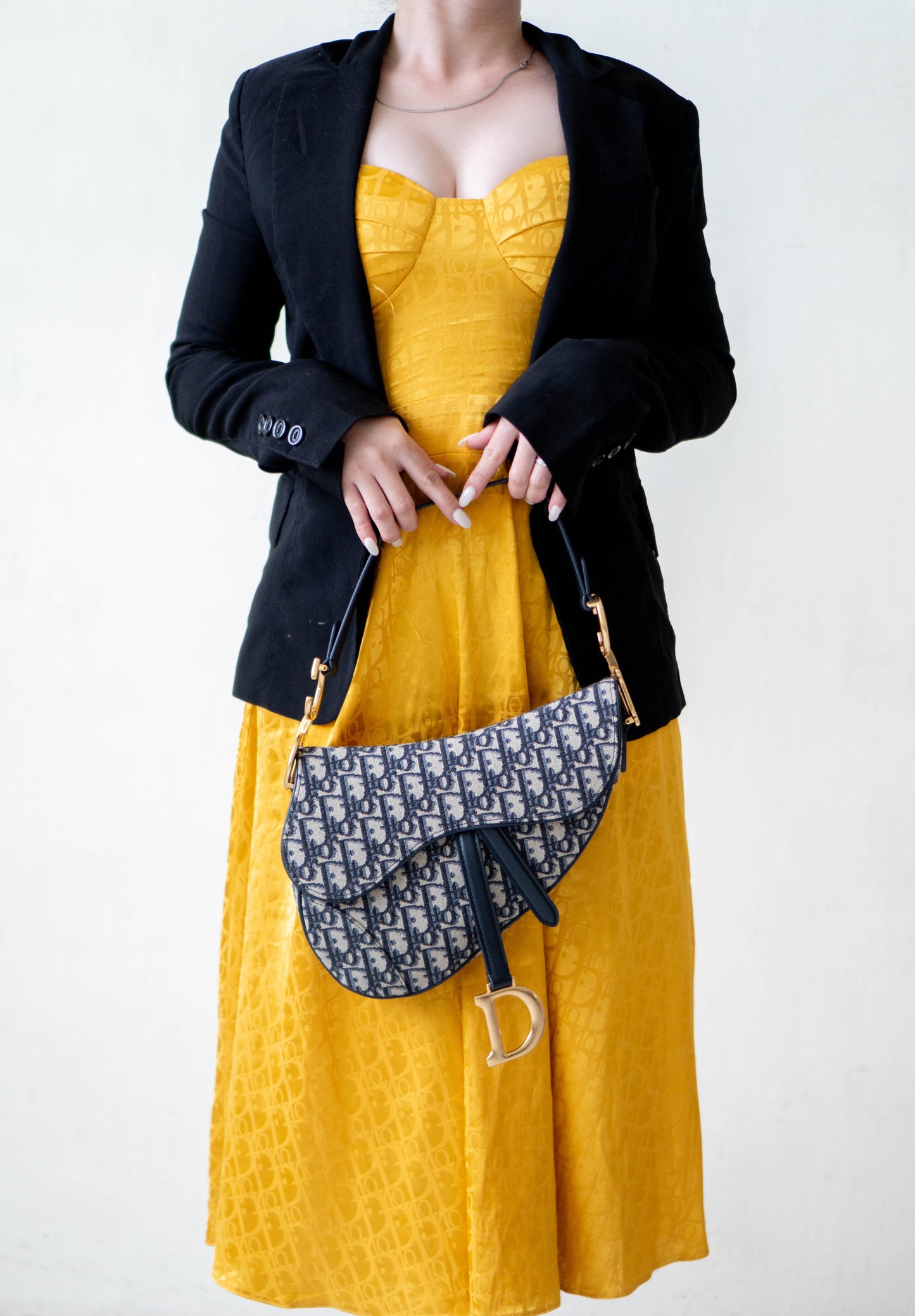 Saddle Oblique Jacquard canvas with calfskin leather