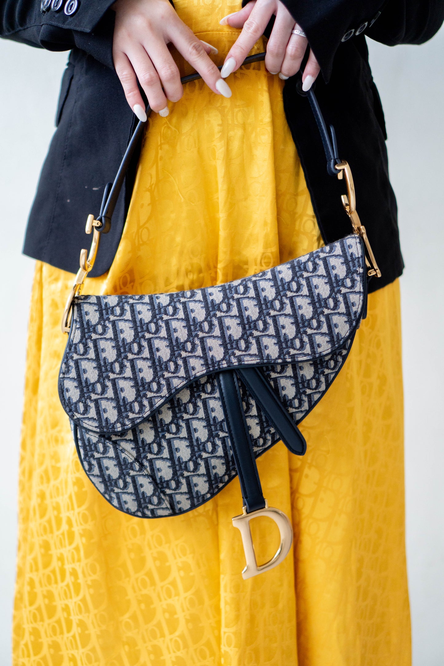 Saddle Oblique Jacquard canvas with calfskin leather