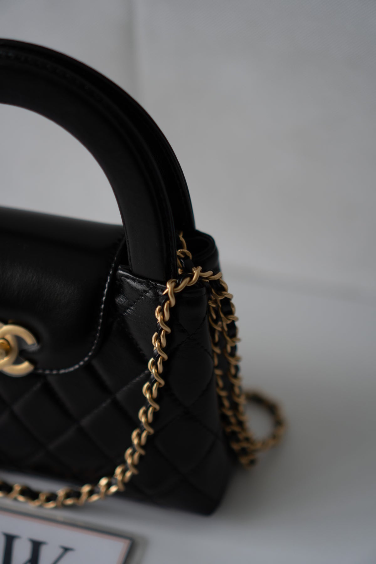 Mini Kelly Top Handle Bag – Black Lambskin
