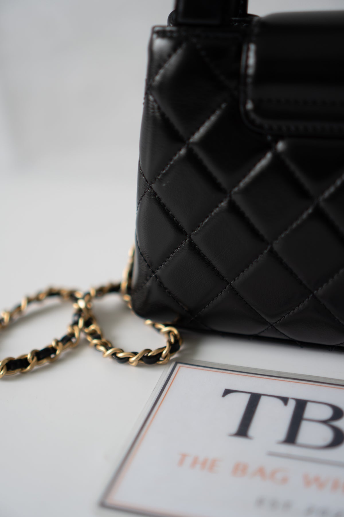 Mini Kelly Top Handle Bag – Black Lambskin