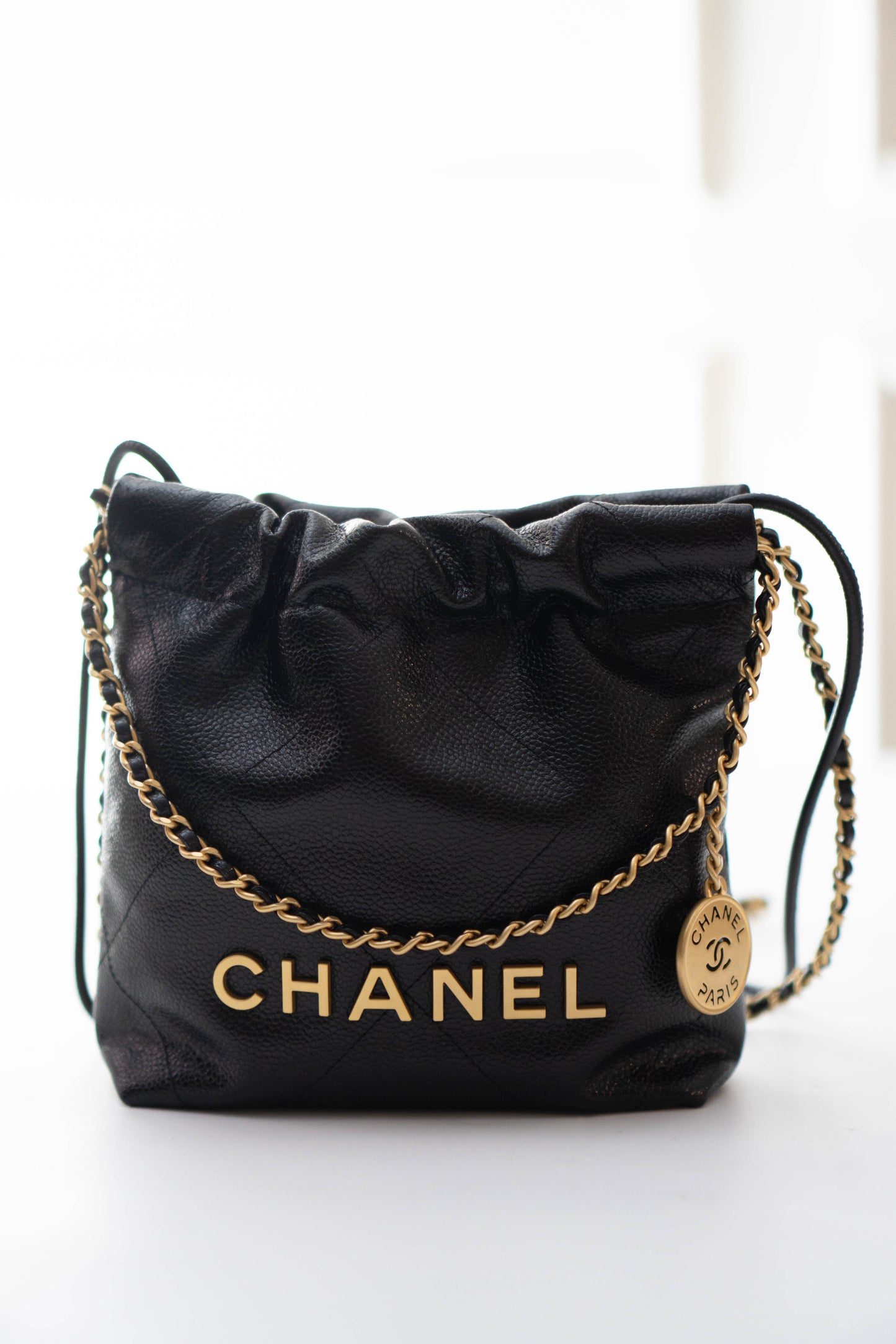 C22 Mini Handbag in Caviar leather