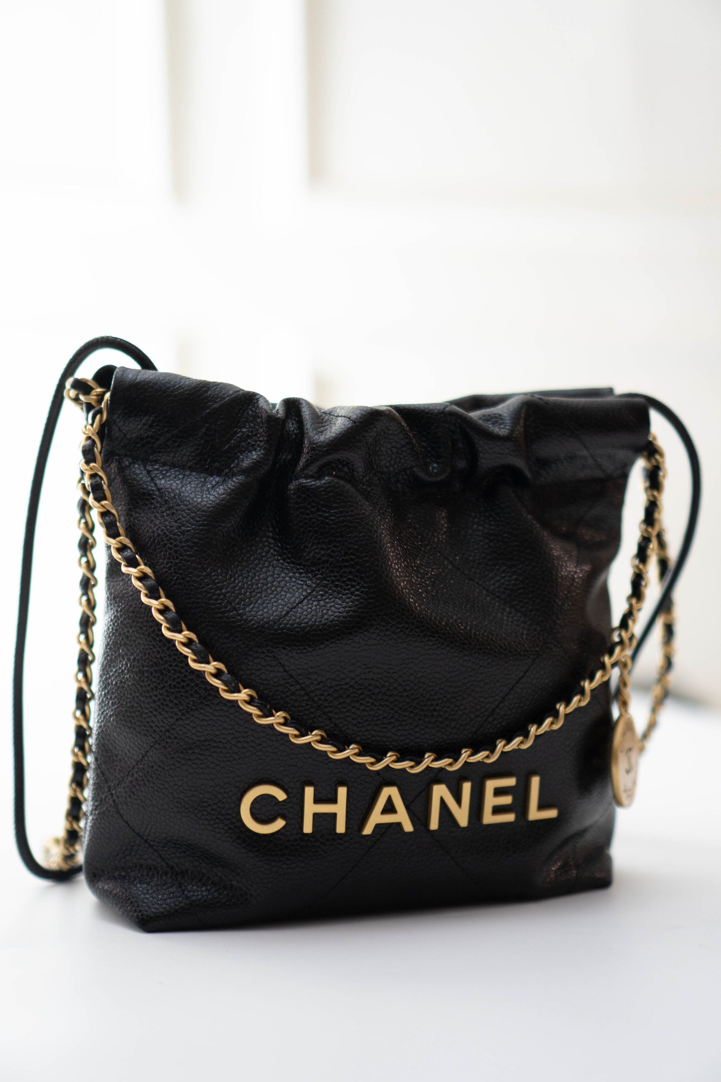 C22 Mini Handbag in Caviar leather