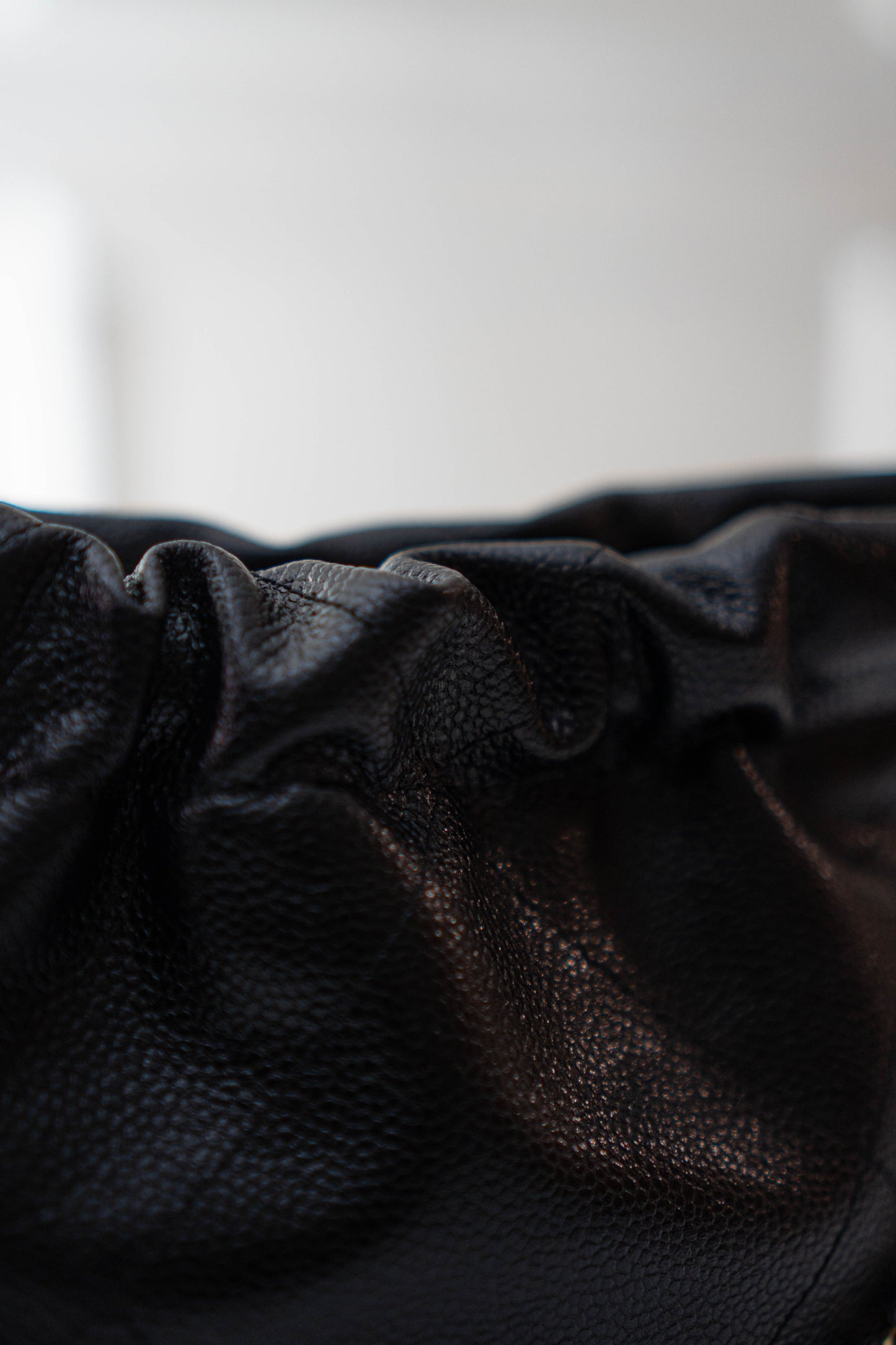 C22 Mini Handbag in Caviar leather
