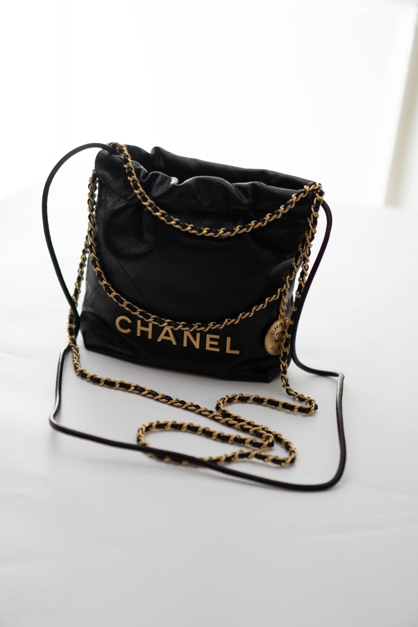 C22 Mini Handbag in Caviar leather