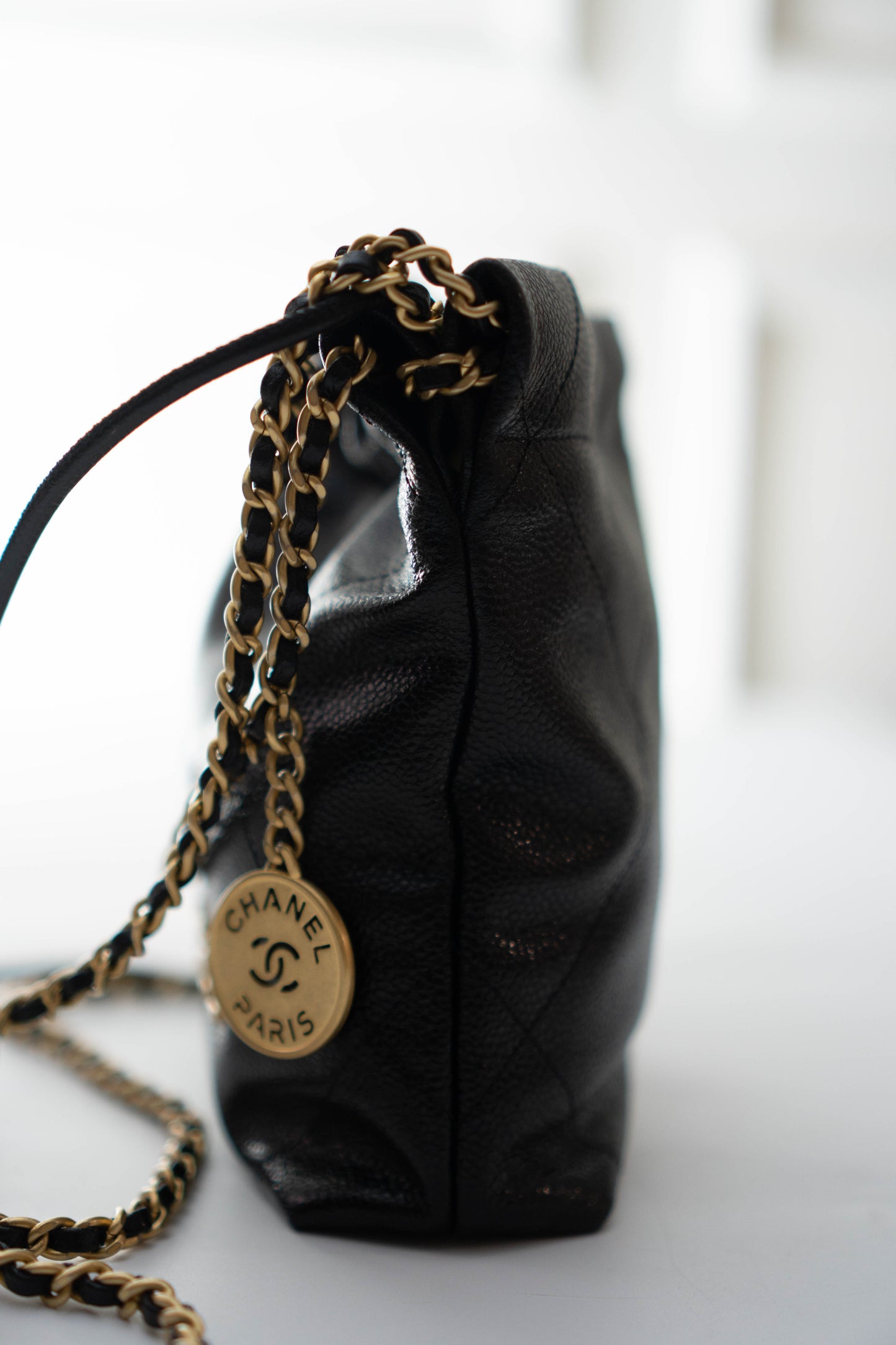 C22 Mini Handbag in Caviar leather