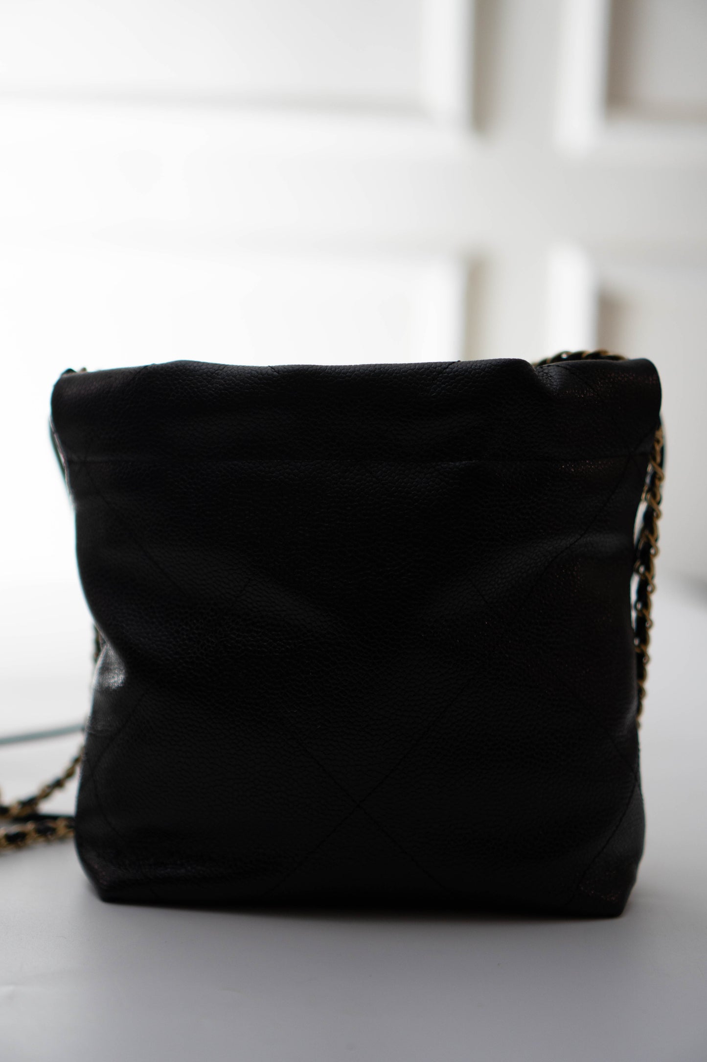 C22 Mini Handbag in Caviar leather