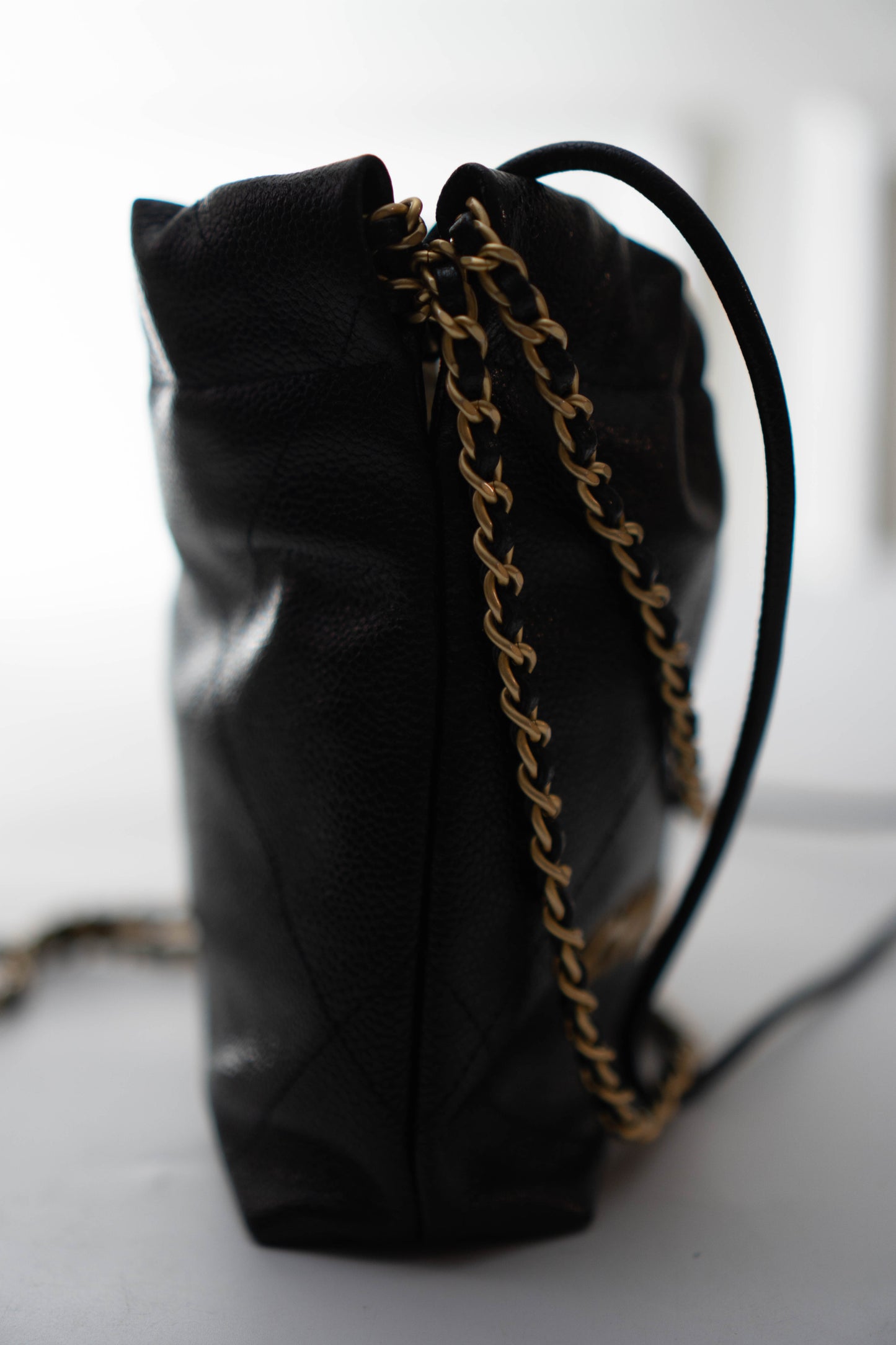 C22 Mini Handbag in Caviar leather