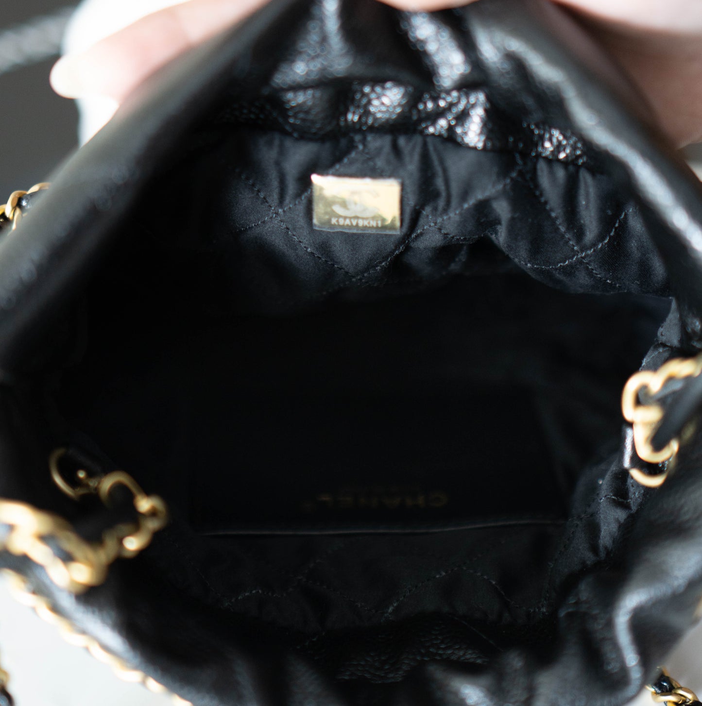 C22 Mini Handbag in Caviar leather