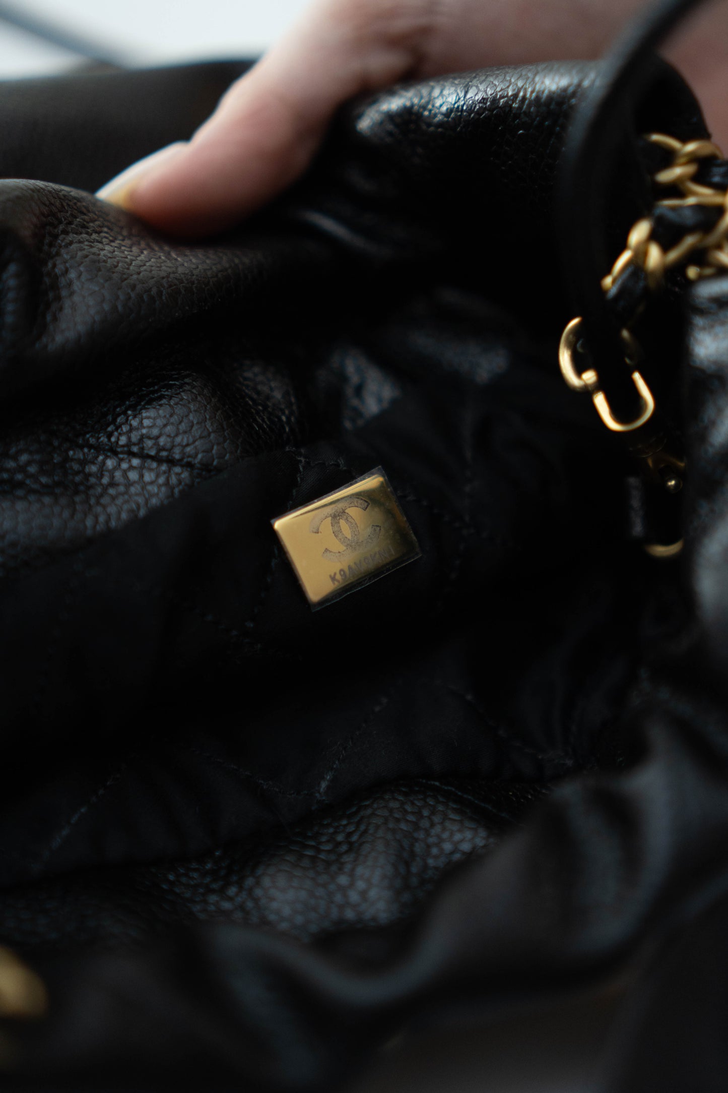 C22 Mini Handbag in Caviar leather