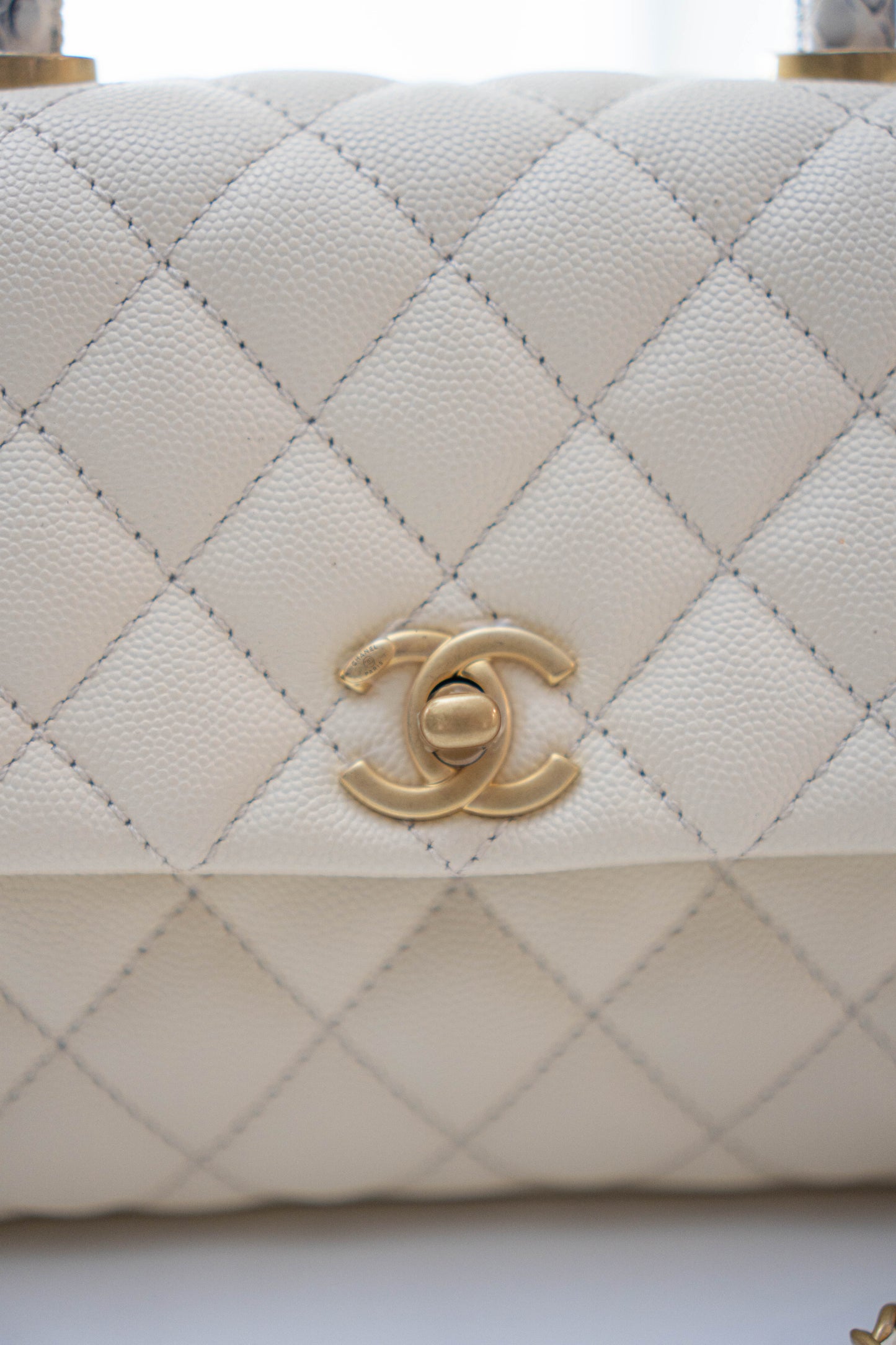 Coco Handle in Ivory or Cream Caviar Leather