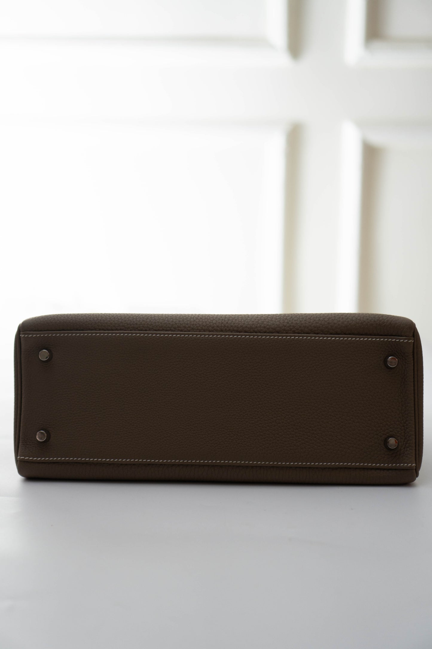 KL Retourne 32 in Etoupe Togo leather