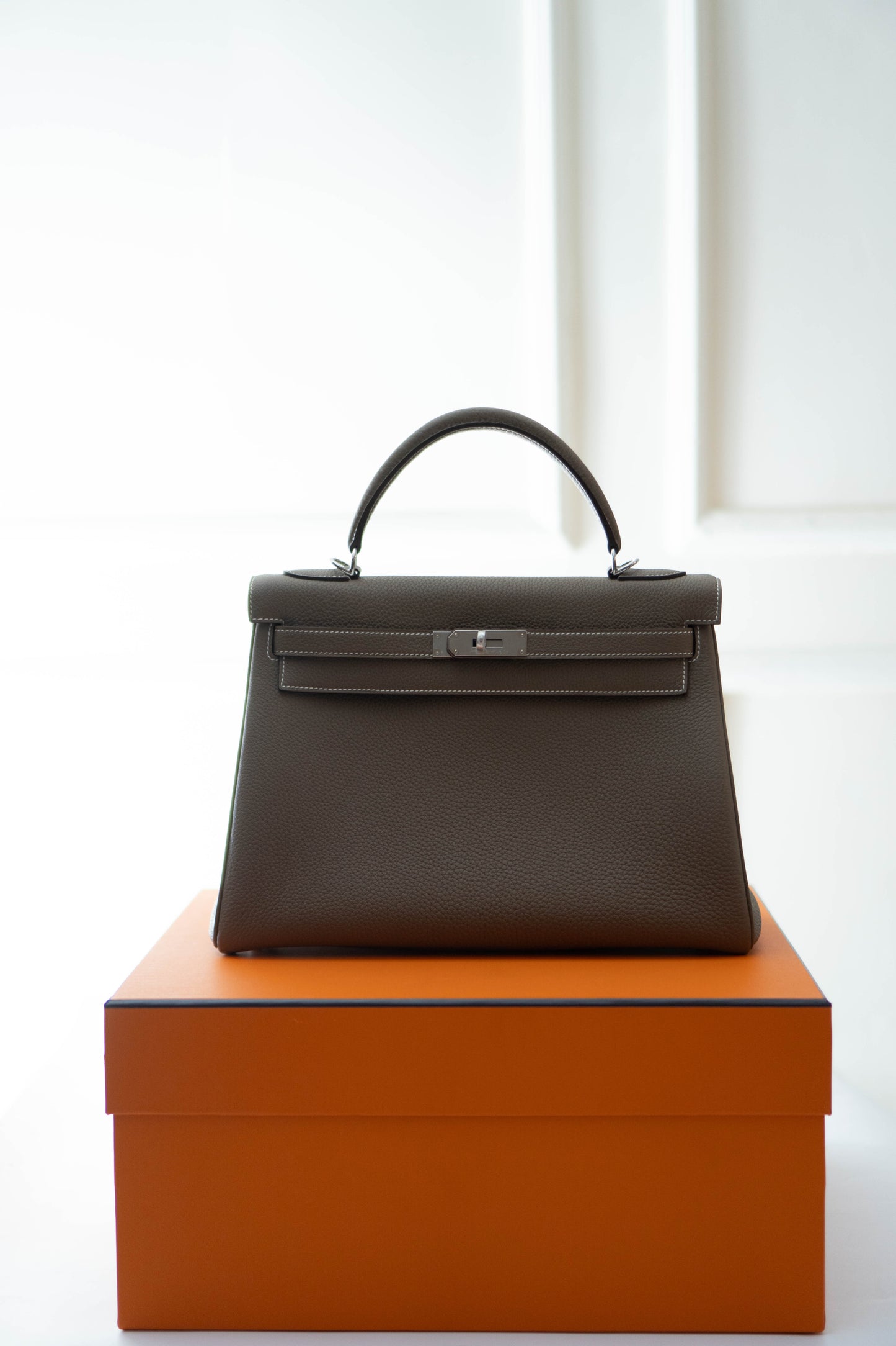 KL Retourne 32 in Etoupe Togo leather