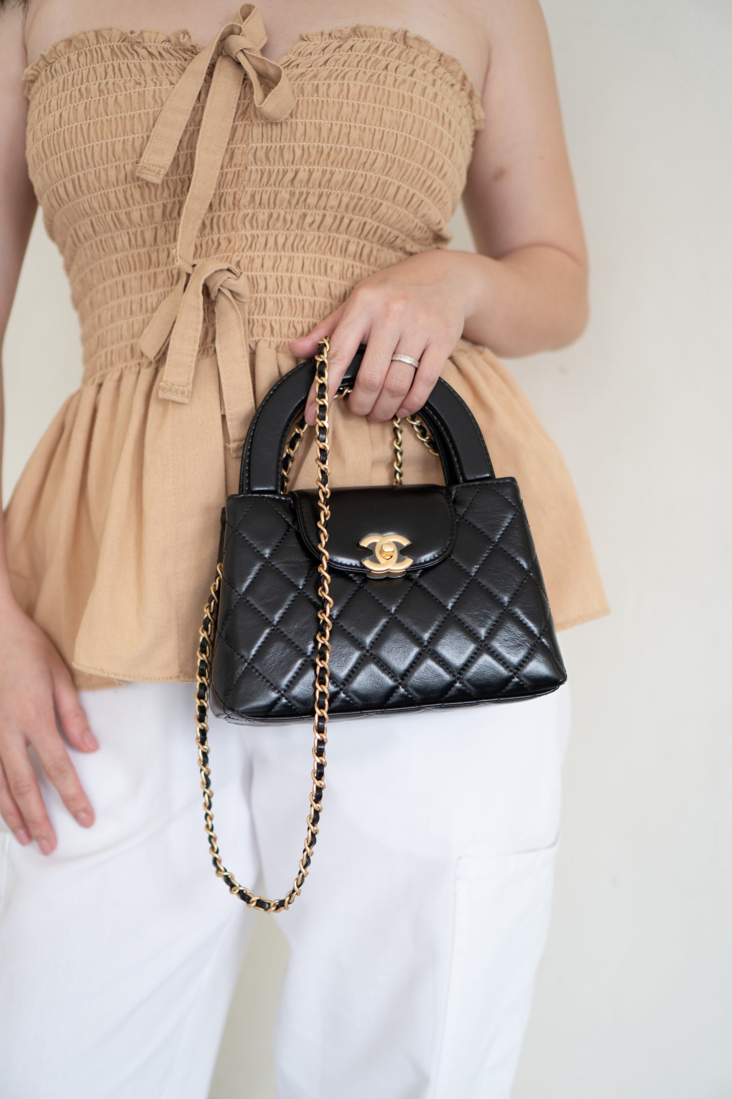 Mini Kelly Top Handle Bag – Black Lambskin