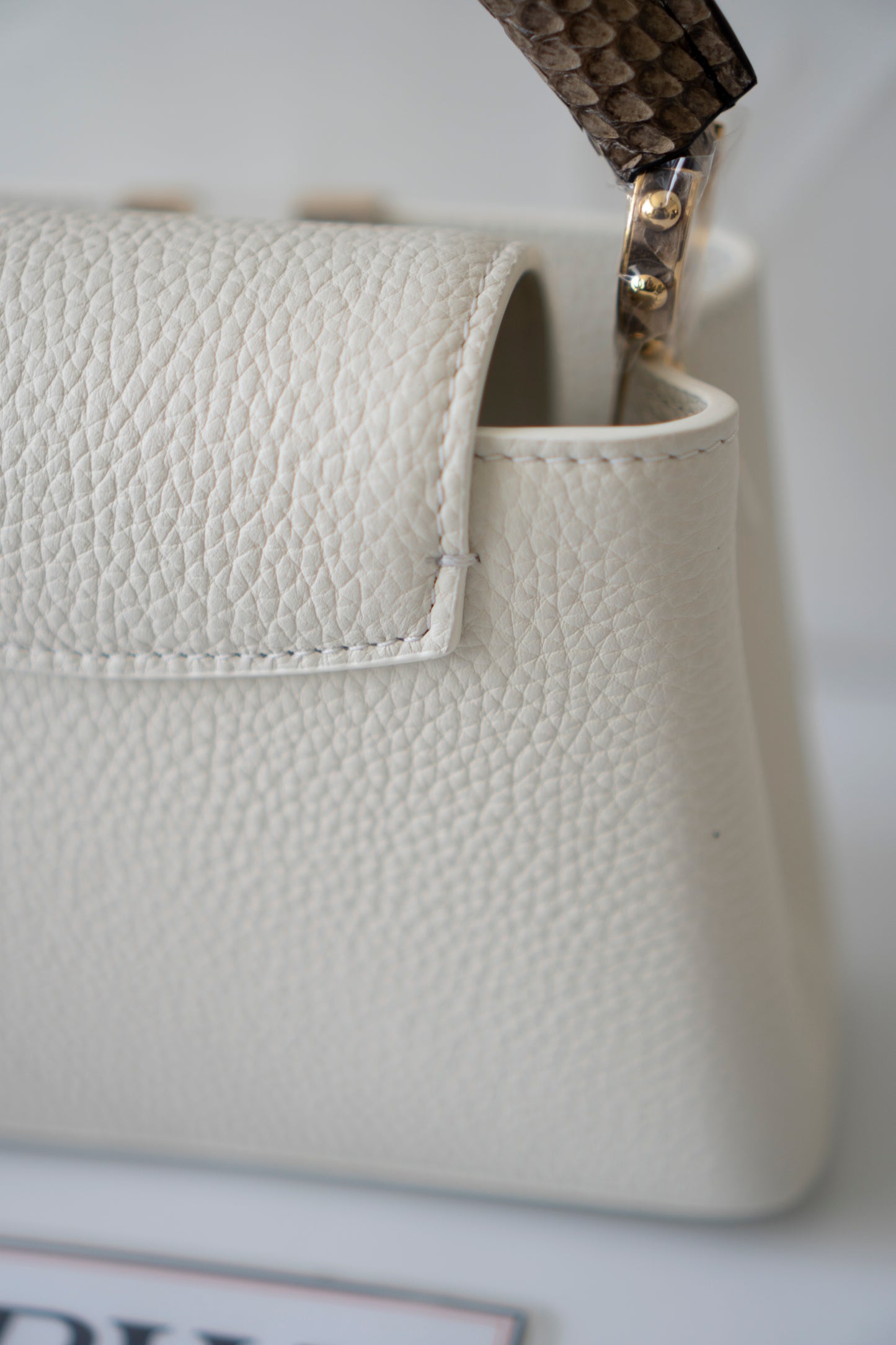Capucines Mini – White Taurillon with Snakeskin Handle
