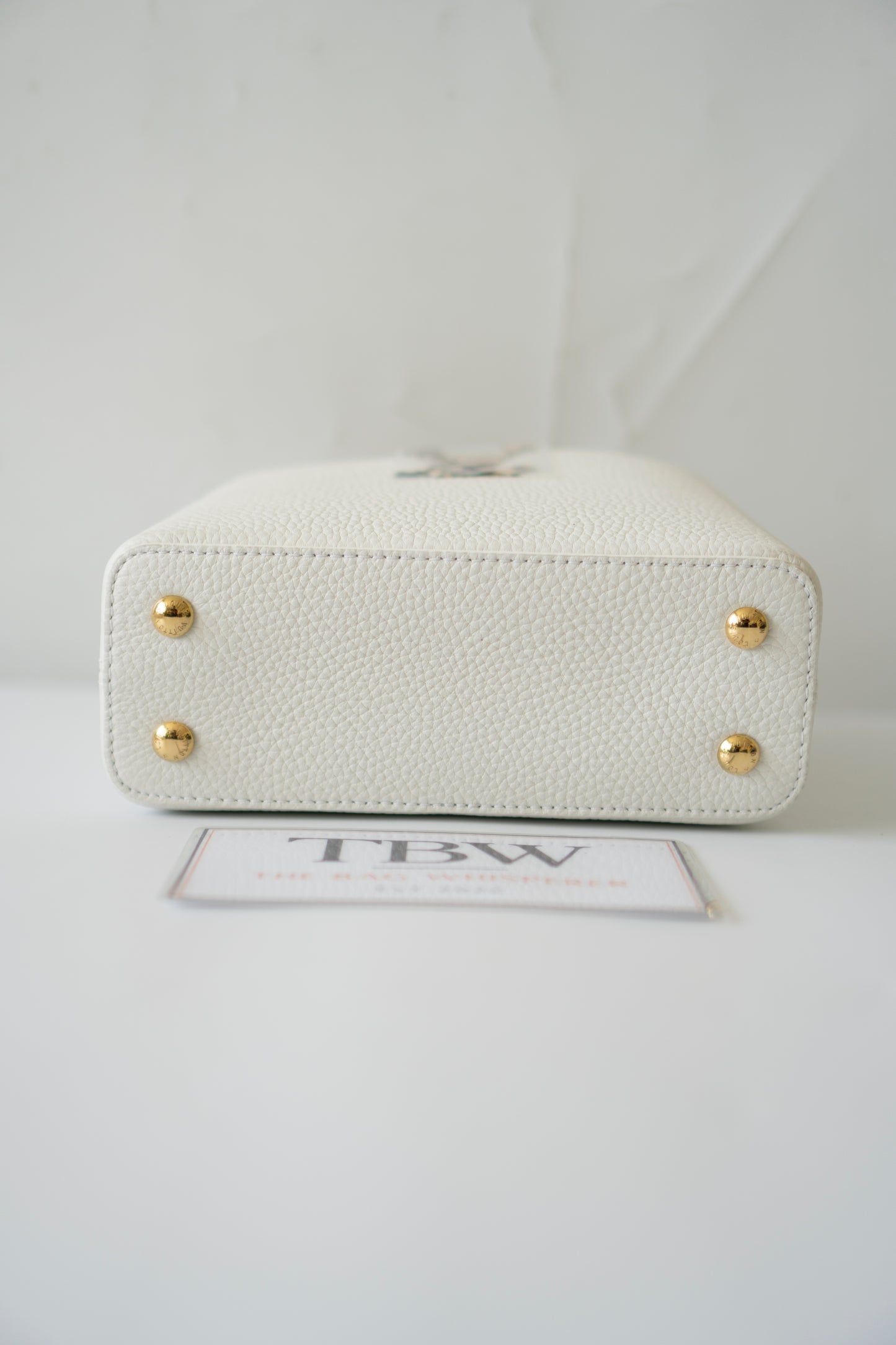 Capucines Mini – White Taurillon with Snakeskin Handle