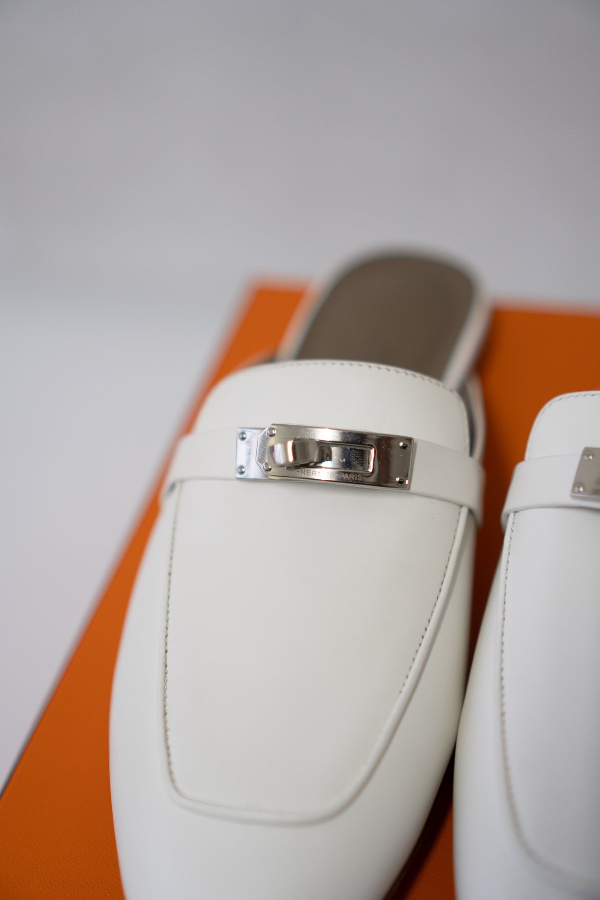 Lock Buckle Leather Mules – Off-White Calfskin with Palladium Hardware