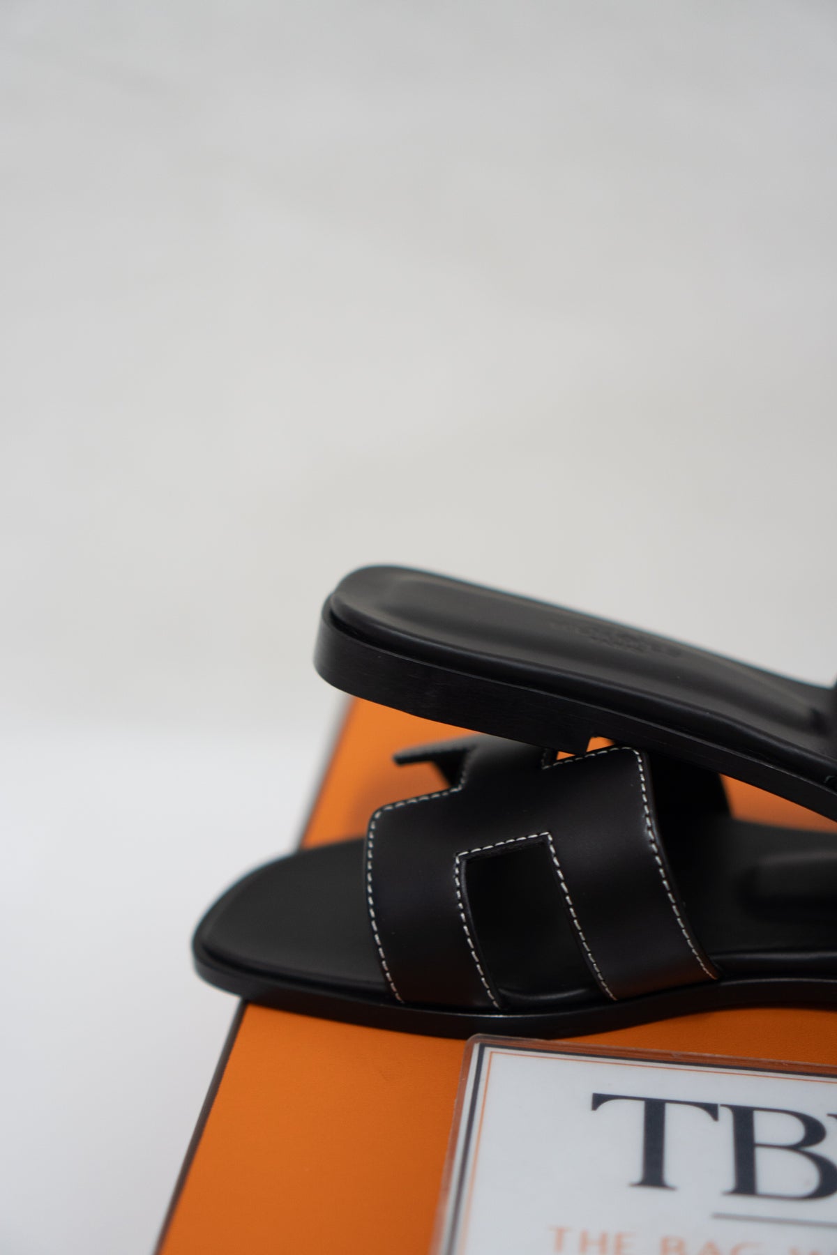 Cutout Flat Slide Sandals – Black Leather with White Contrast Stitching