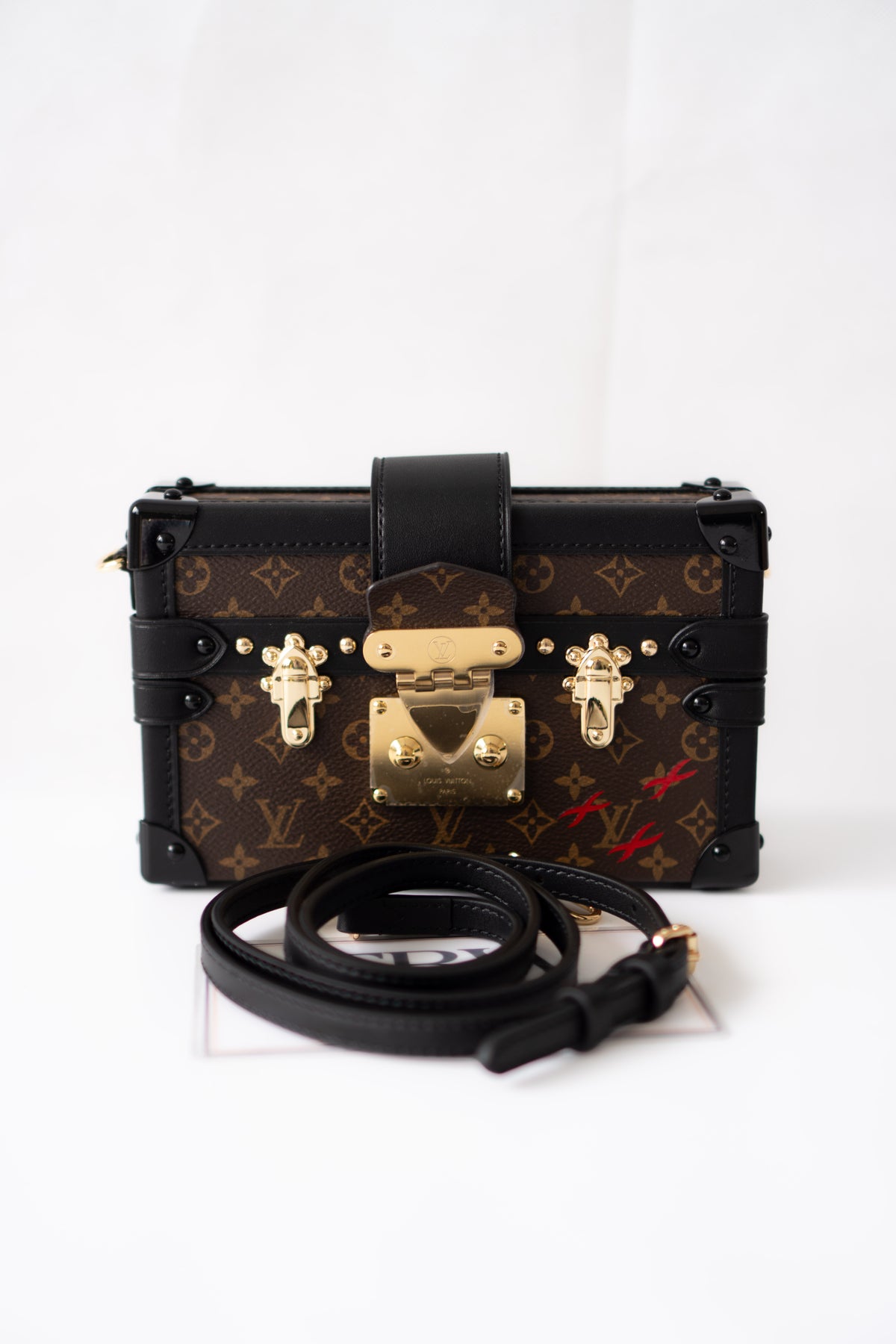 Petite Malle – Monogram Canvas with Black Calfskin & Gold-Tone Hardware
