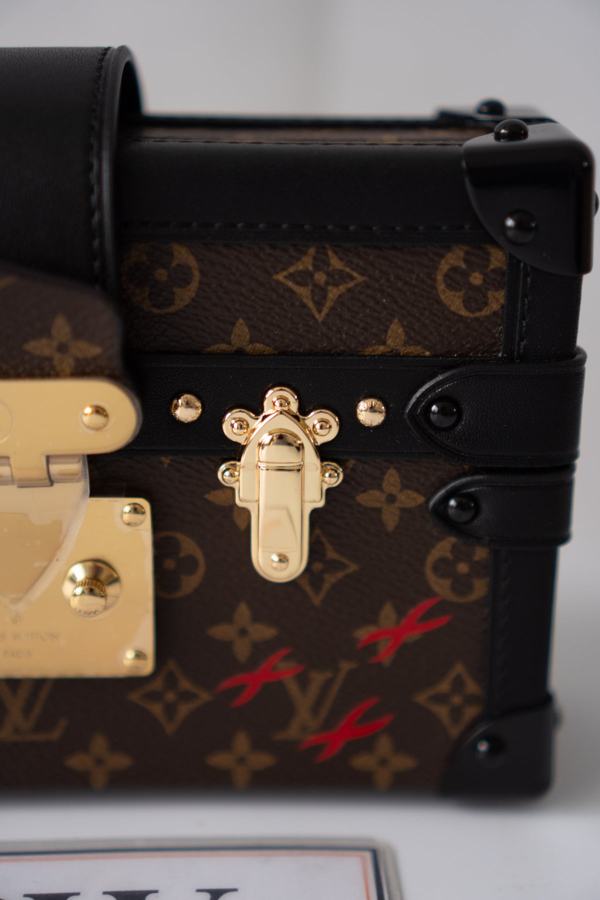 Petite Malle – Monogram Canvas with Black Calfskin & Gold-Tone Hardware