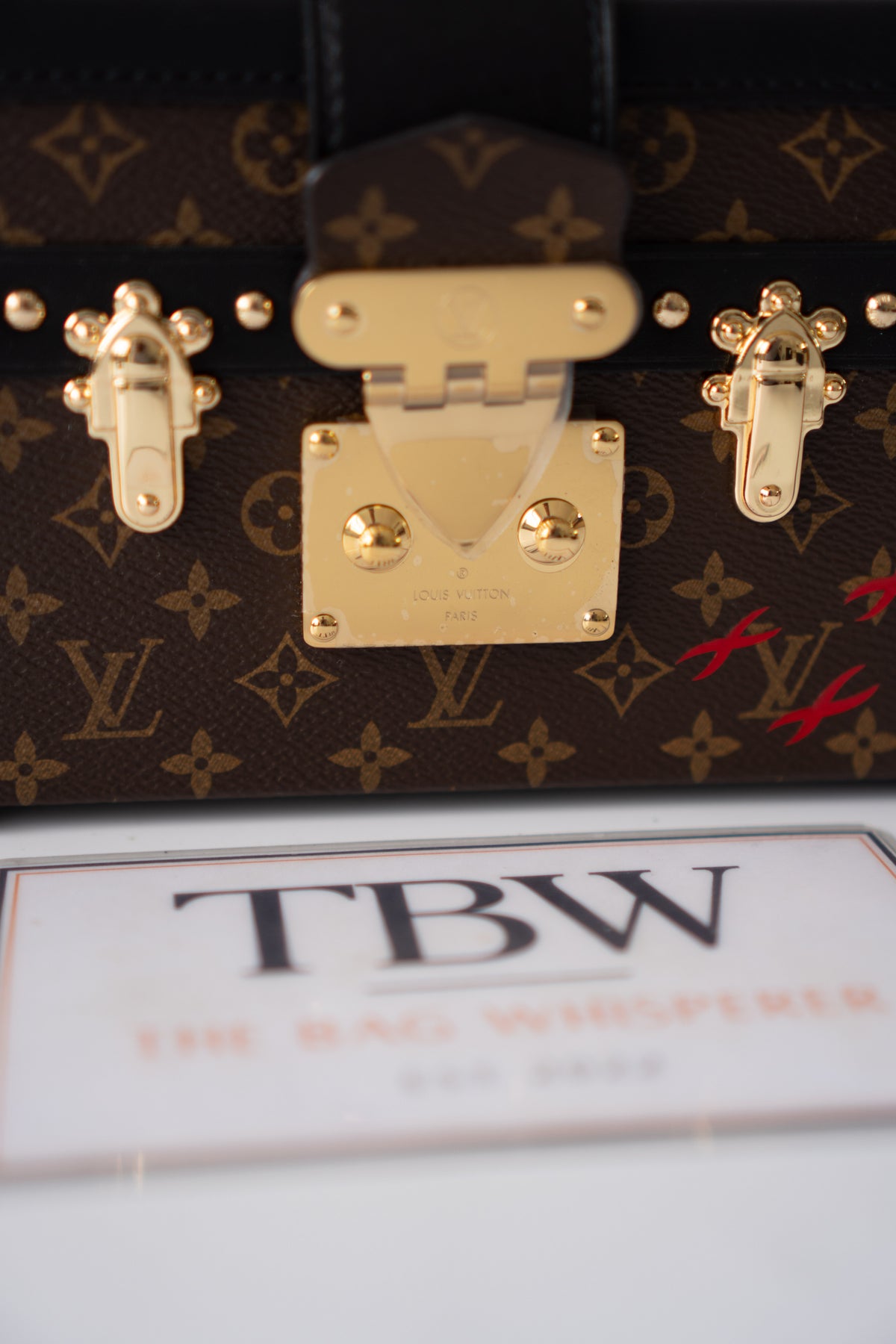 Petite Malle – Monogram Canvas with Black Calfskin & Gold-Tone Hardware